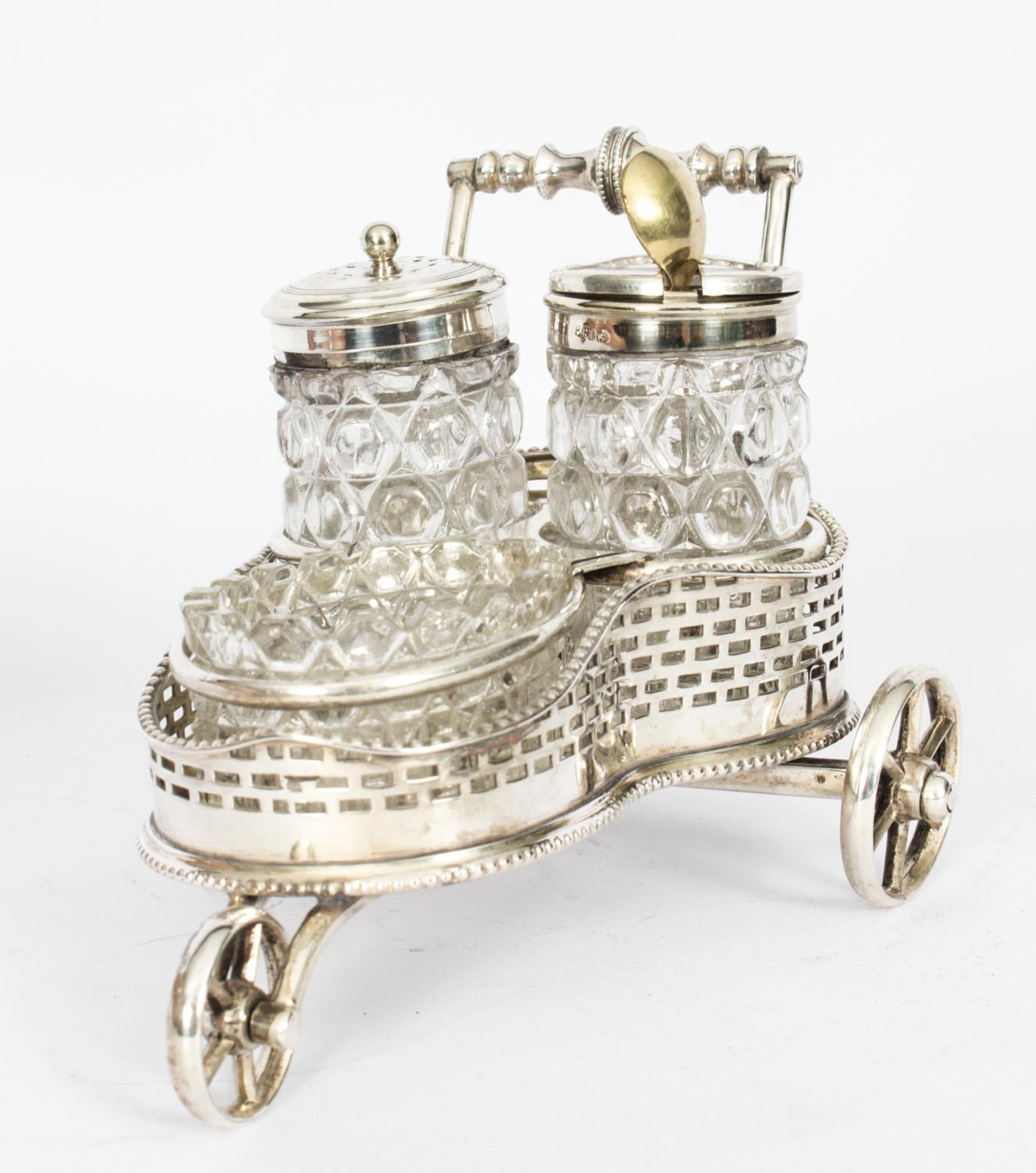 This is a gorgeous antique Victorian silver plated cruet set circa 1885 in date.
 
The set comprises a beautifully decorative silver plated cruet stand with cut glass containers for salt, pepper and mustard,

The antique silver plated cruet