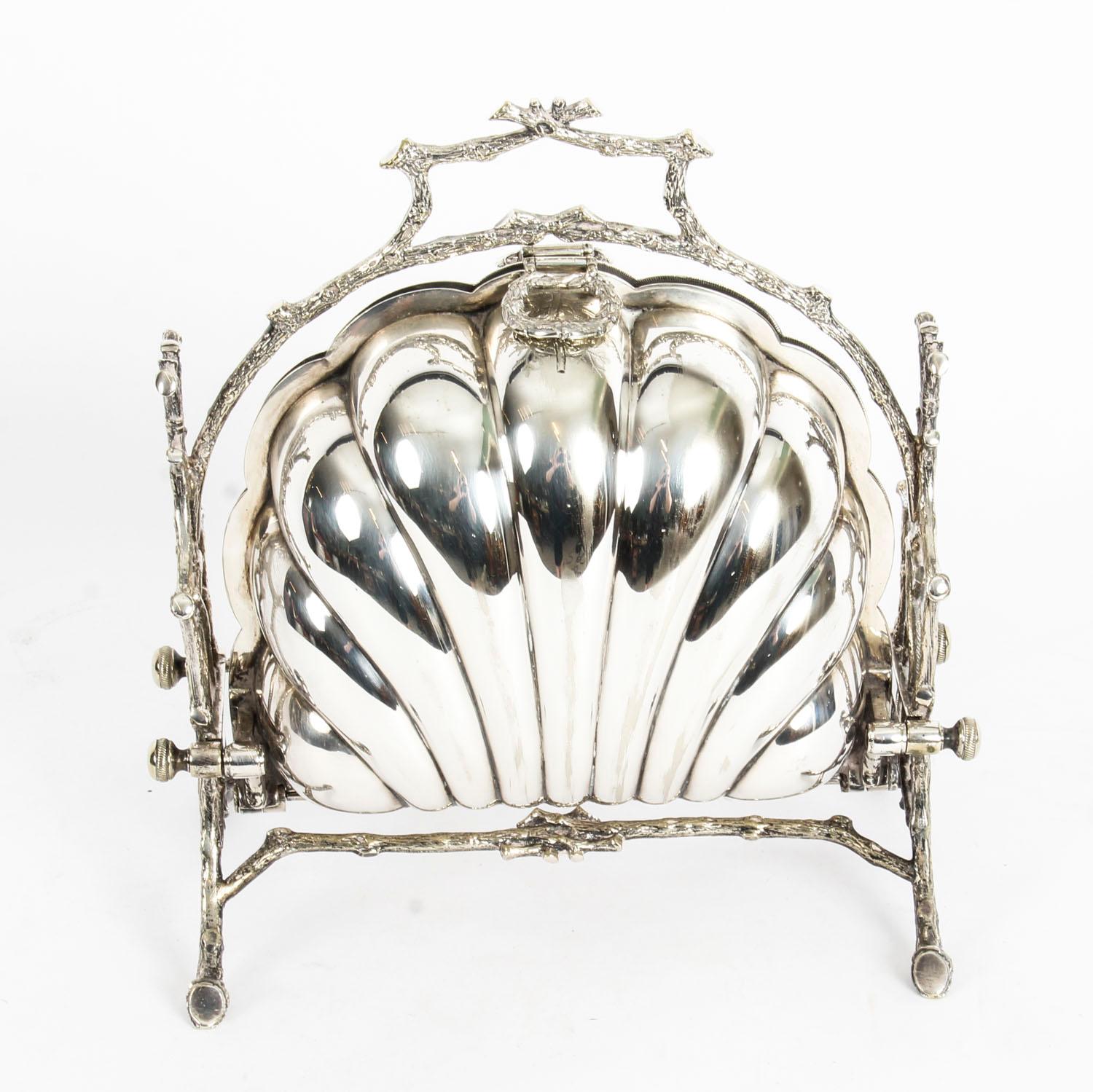 This is a highly decorative antique Victorian silver plated folding biscuit box, the base bearing the makers' mark of the renowned silversmiths Fenton Brothers of Sheffield, England, circa 1890 in date and bearing the Staniforth's Patent mark as