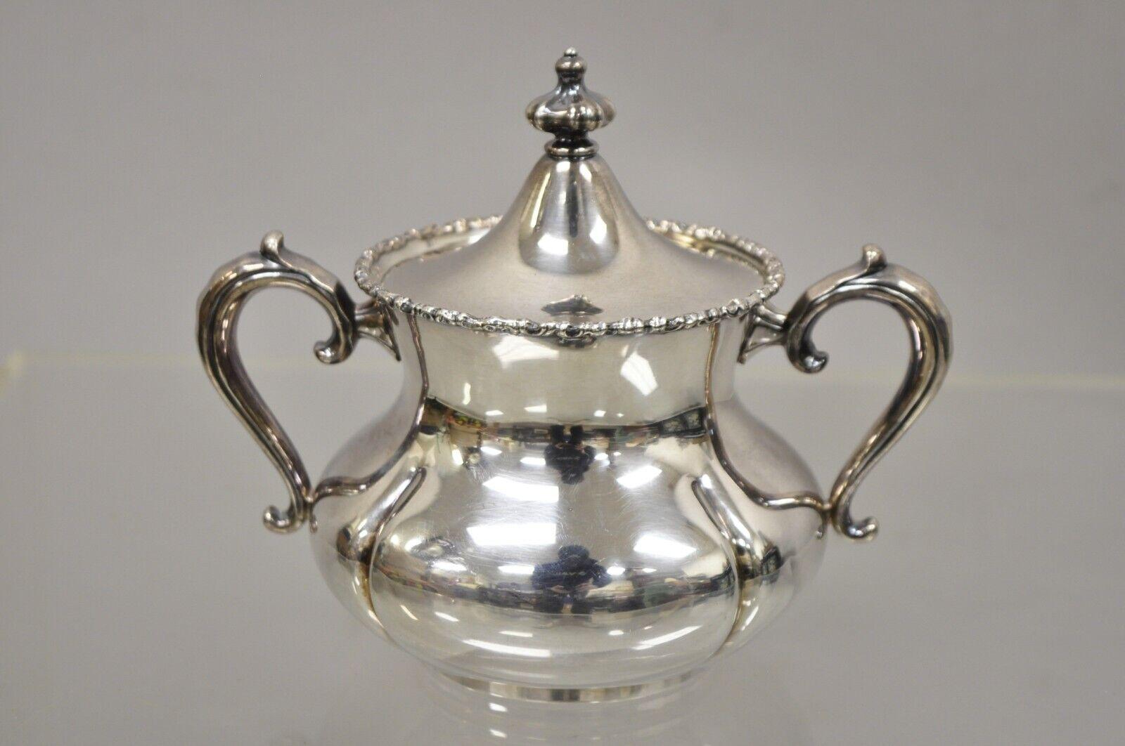 Antique Victorian silver plated tea set with english platter tray - 6 pc set. Item features (1) Coffee pot, (1) tea pot, (1) lidded sugar bowl, (1) other bowl, (1) creamer without lid. Serving pieces by American Silver Plate Co. Tray is marked on