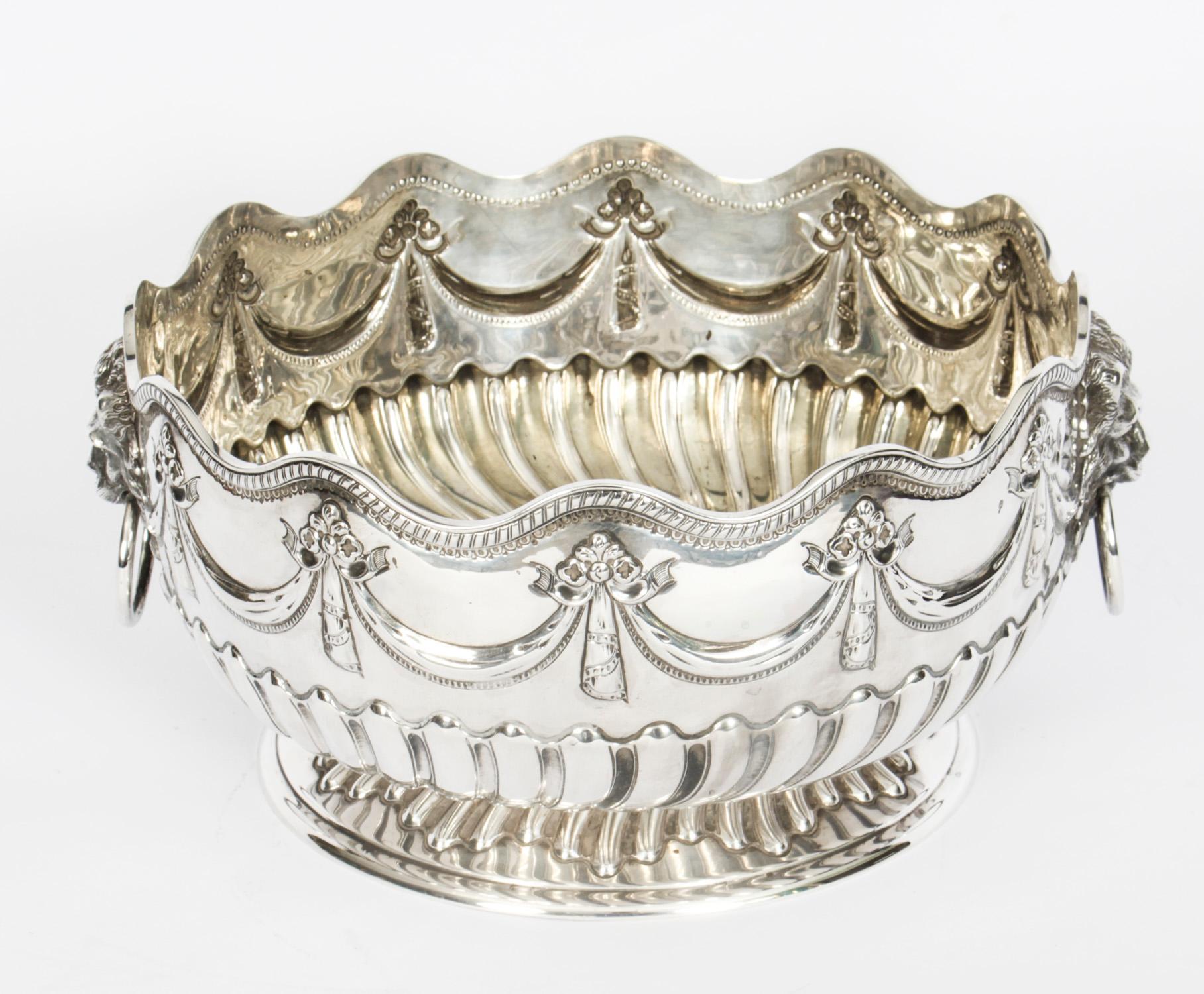 This is a large gorgeous antique Victorian sterling silver punch bowl bearing the makers mark of the renowned silversmiths Frederick Elkington, of Elkington & Co and hallmarks for Sheffield 1884.
 
This exquisite punch bowl is also ideal as a