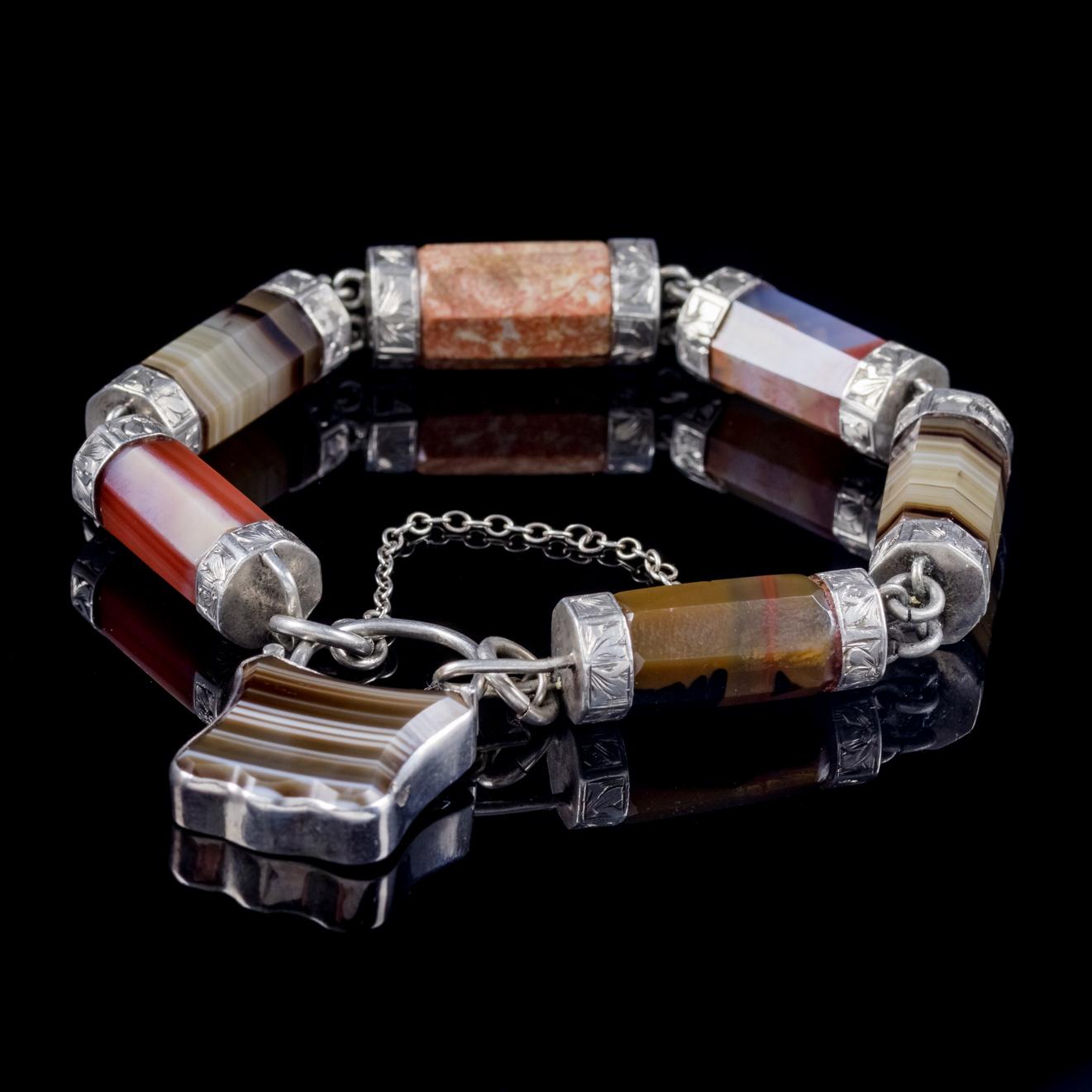A wonderful antique Victorian Scottish bracelet C. 1860, made up of lovely barrel Agate links set with engraved Silver tips. 

Scottish jewellery was made popular by Queen Victoria as it became a souvenir of her frequent trips to Scotland and her