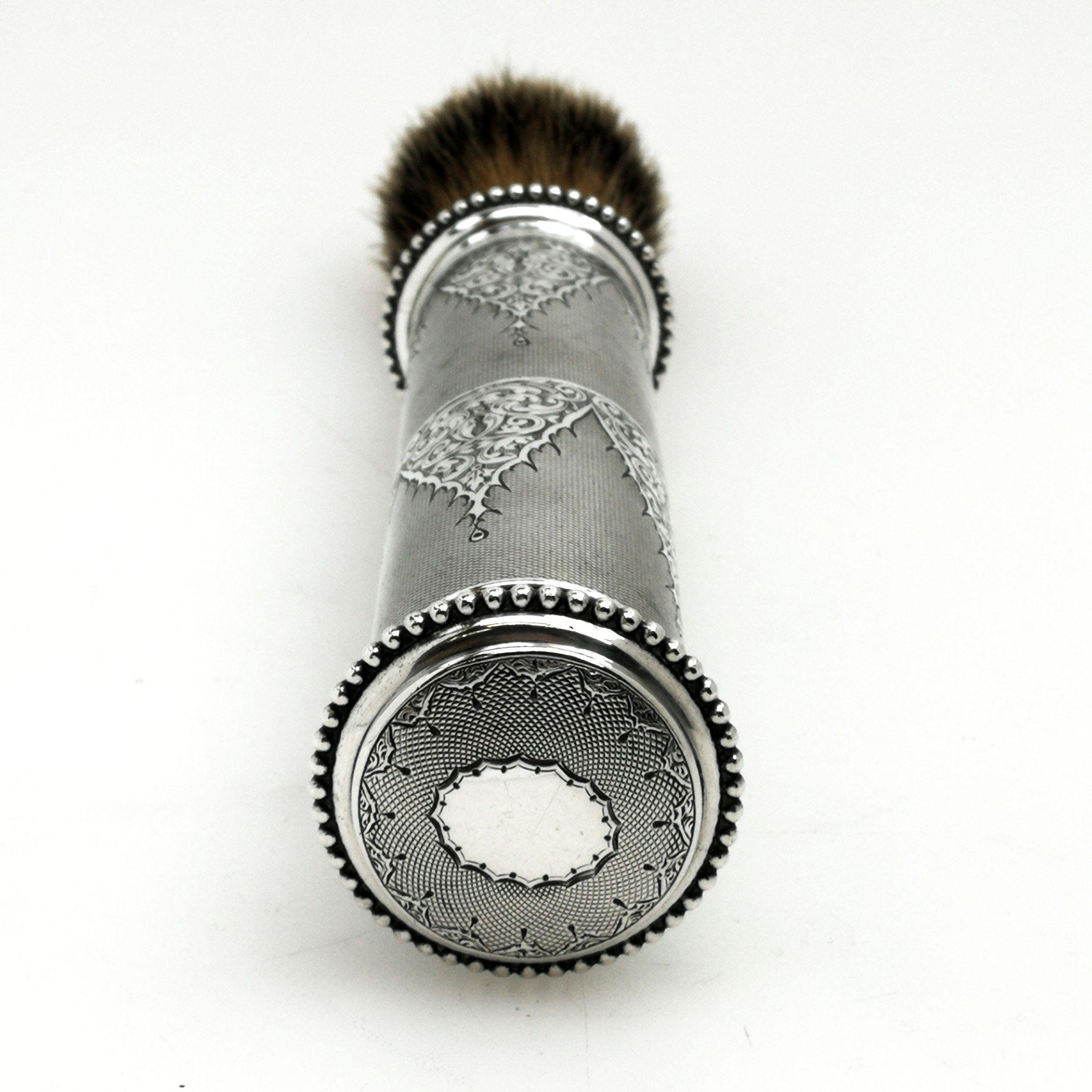 An amazing Antique Victorian Sterling Silver Shaving Brush / Travelling Shaving Brush Set that when closes is a secure case for a shaving brush with room to store some soap. Once unscrewed and re assembled, the shaving brush has a nice long handle