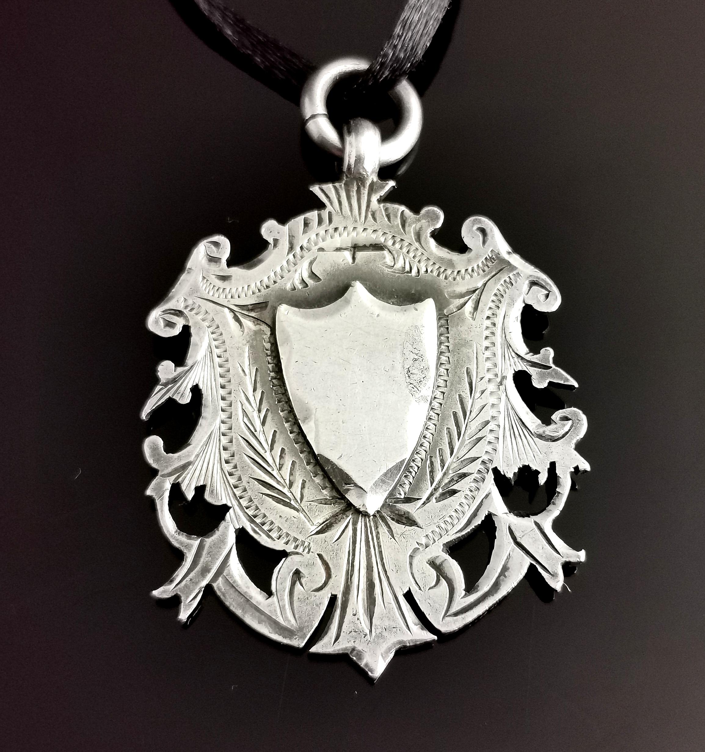 silver shield pendant