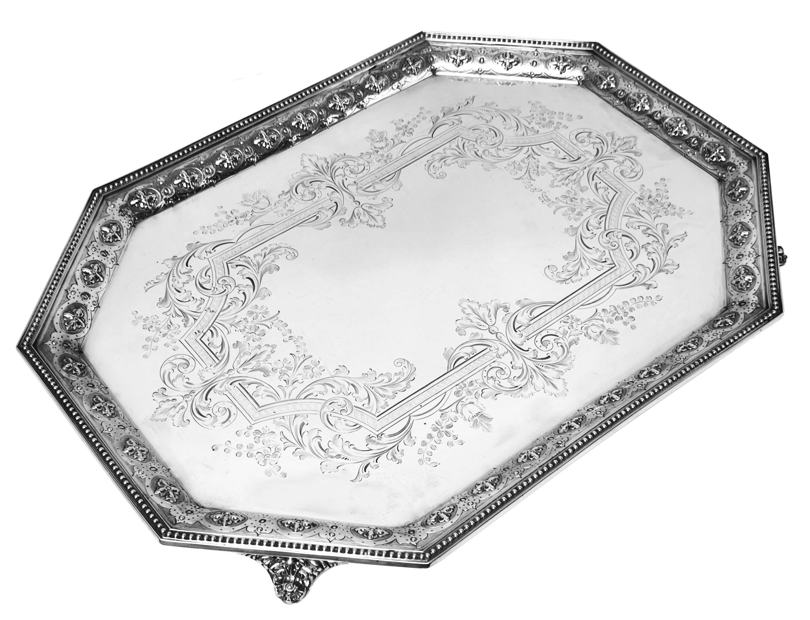 A beautiful Antique Victorian Silver Tray with an elegant octagonal shaped border. The rim of the Silver Tray has an classic bead design on the very edge and an internal border of stylised pattens. The Victorian Tray features a lovely engraved