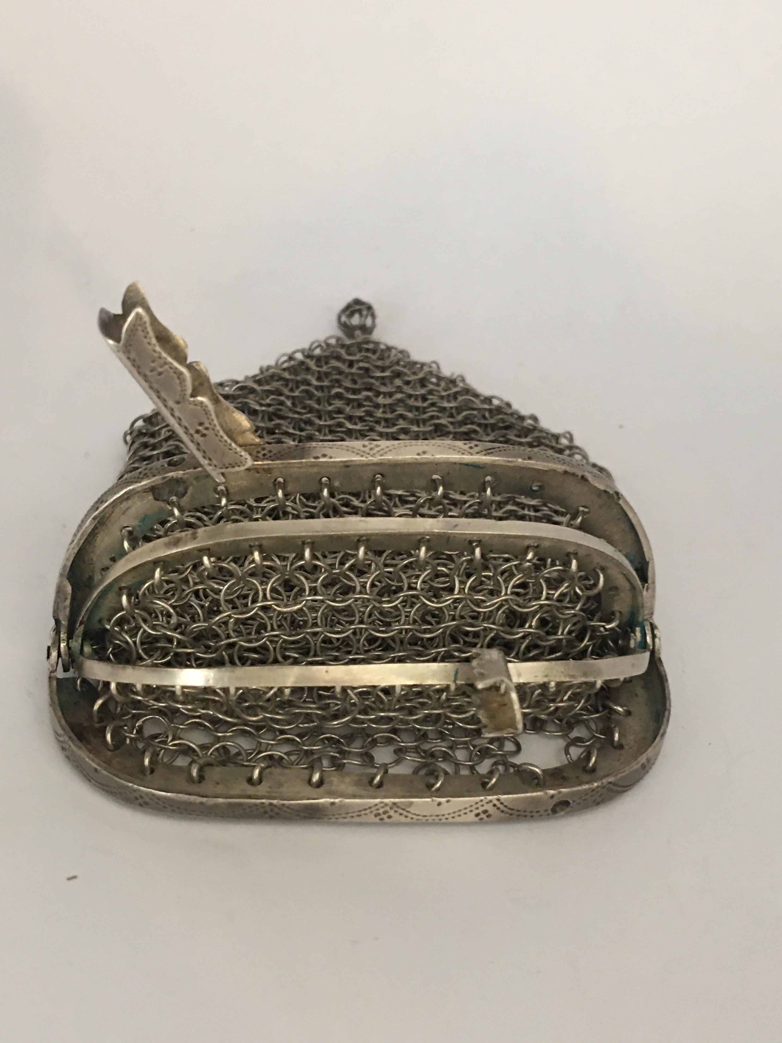 This beautiful antique silver wire pouch is in good condition. It’s measurements are 5 inches long and 2.8 inches wide. Please study the images carefully as form part of the description.