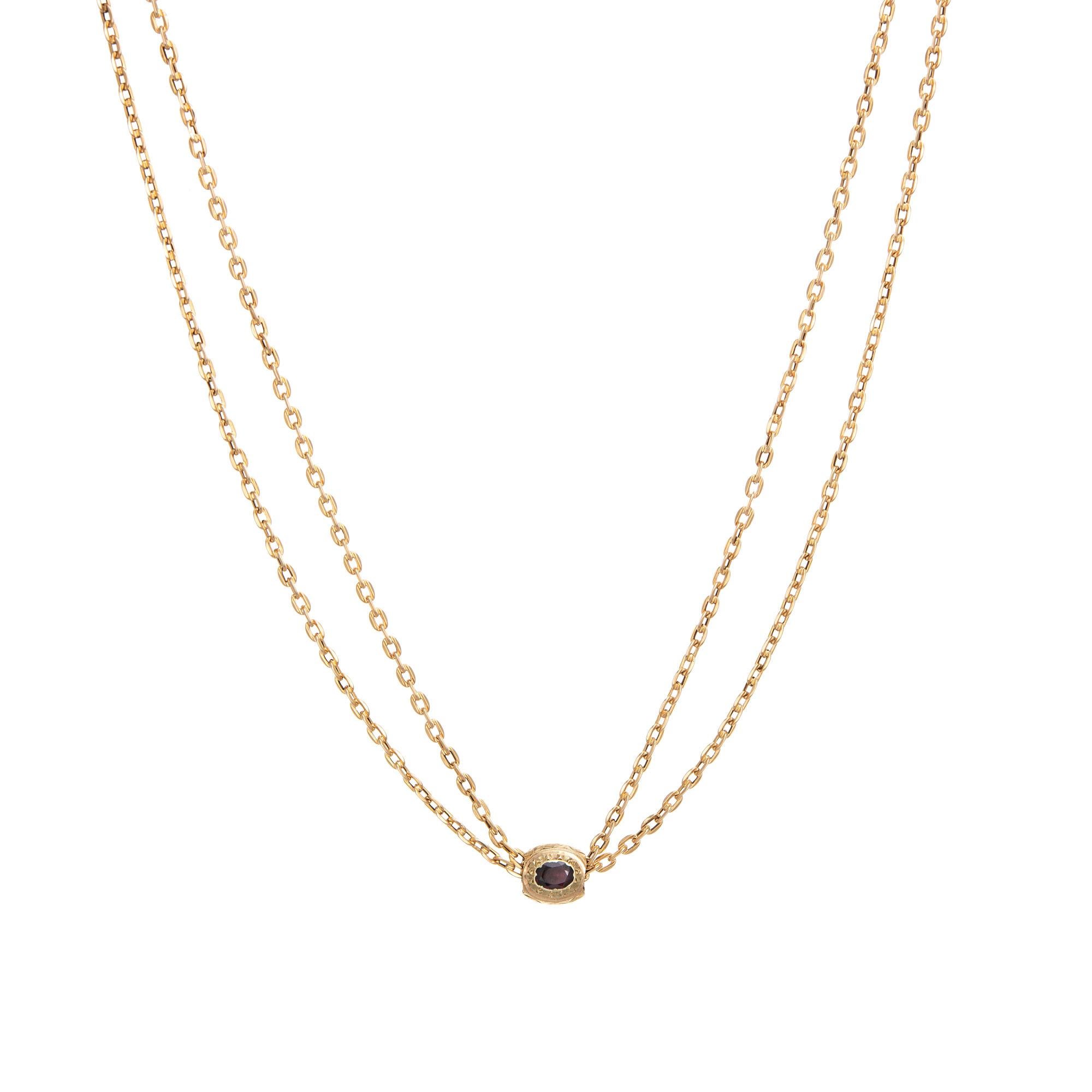 Stylish and finely detailed antique Victorian slide necklace crafted in 14k yellow gold (circa 1880s to 1900s). 

The long 32