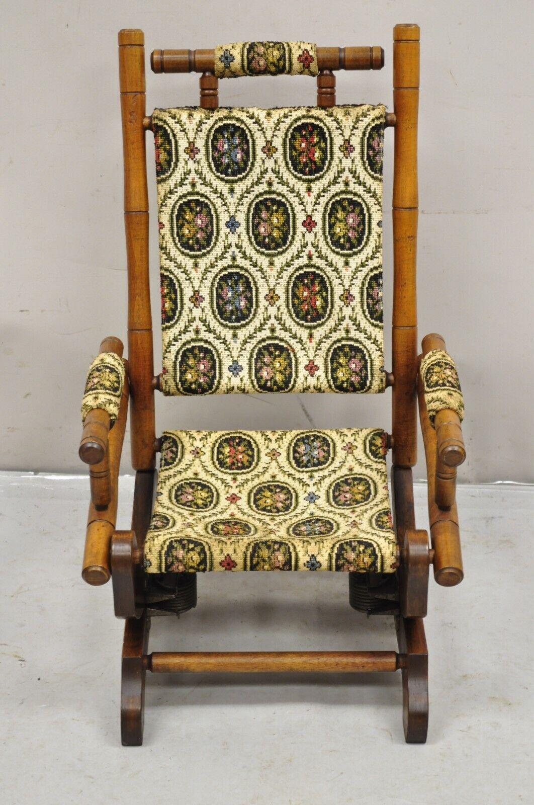Antique Victorian Small Child's Maple Wood Platform Rocker Rocking Chair. Item features floral tapestry upholstery, platform spring rocker, unique small chair. Circa 1900. Measurements: 25.5