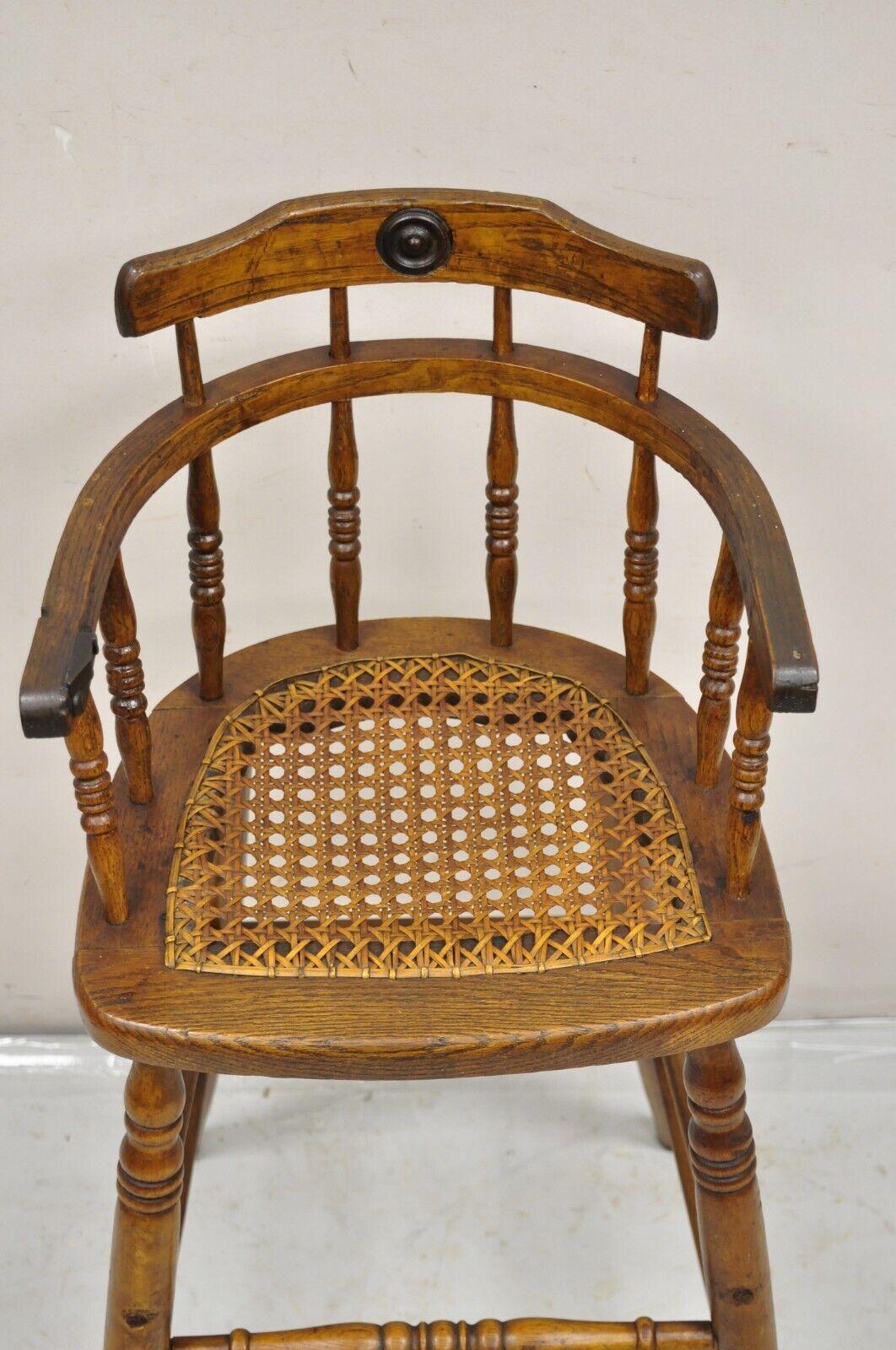 Antique Victorian Small Child's Oak Wood Spindle Cane Seat High Chair In Good Condition For Sale In Philadelphia, PA
