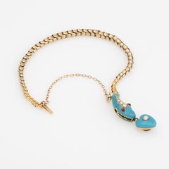 Antico bracciale vittoriano a serpente in oro 18 carati, smalto blu, granato, perla, antico