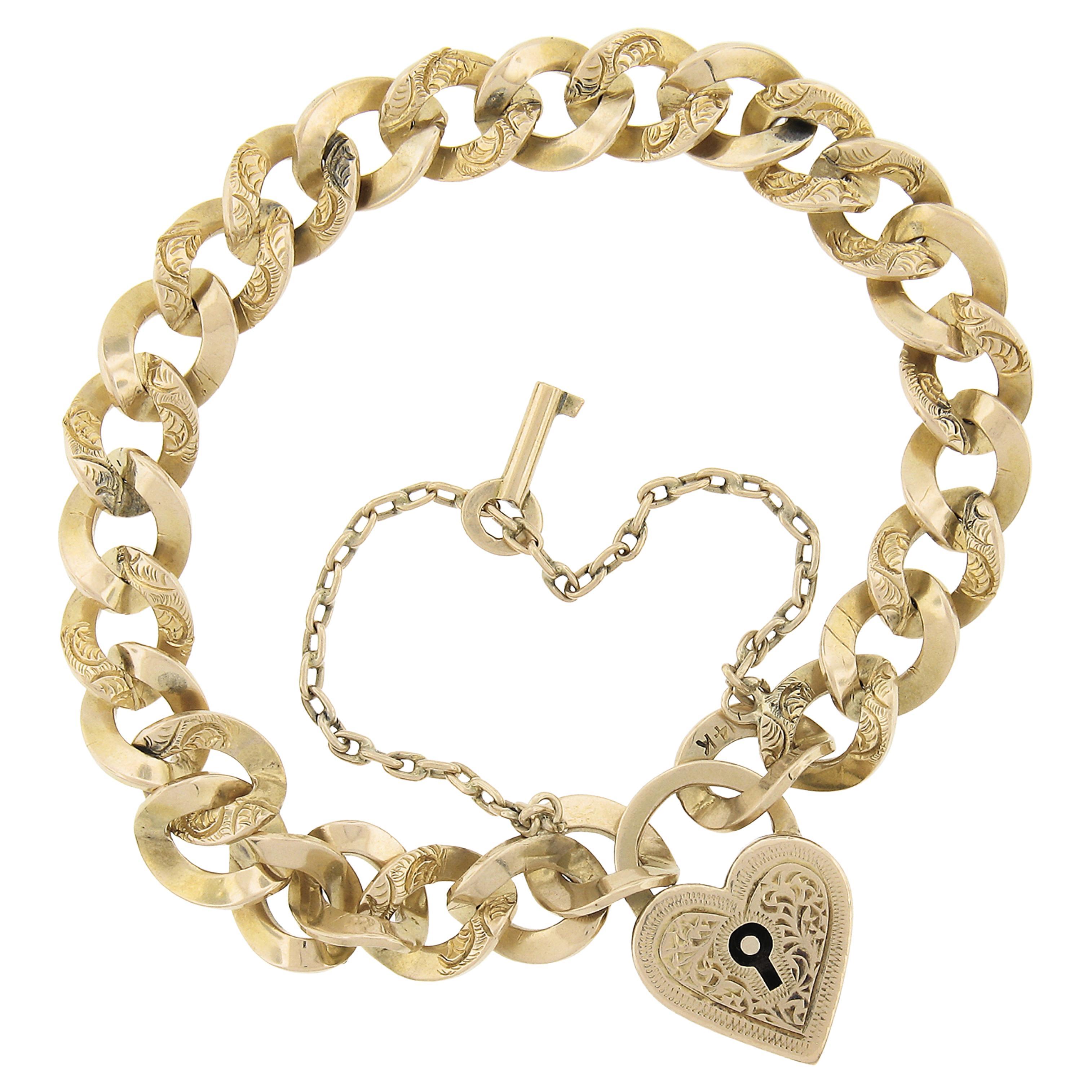 Bracelet victorien ancien à maillons coulissants en or massif avec cadenas en forme de cœur et clé en vente