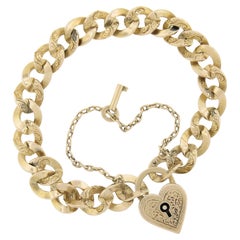 Bracelet victorien ancien à maillons coulissants en or massif avec cadenas en forme de cœur et clé