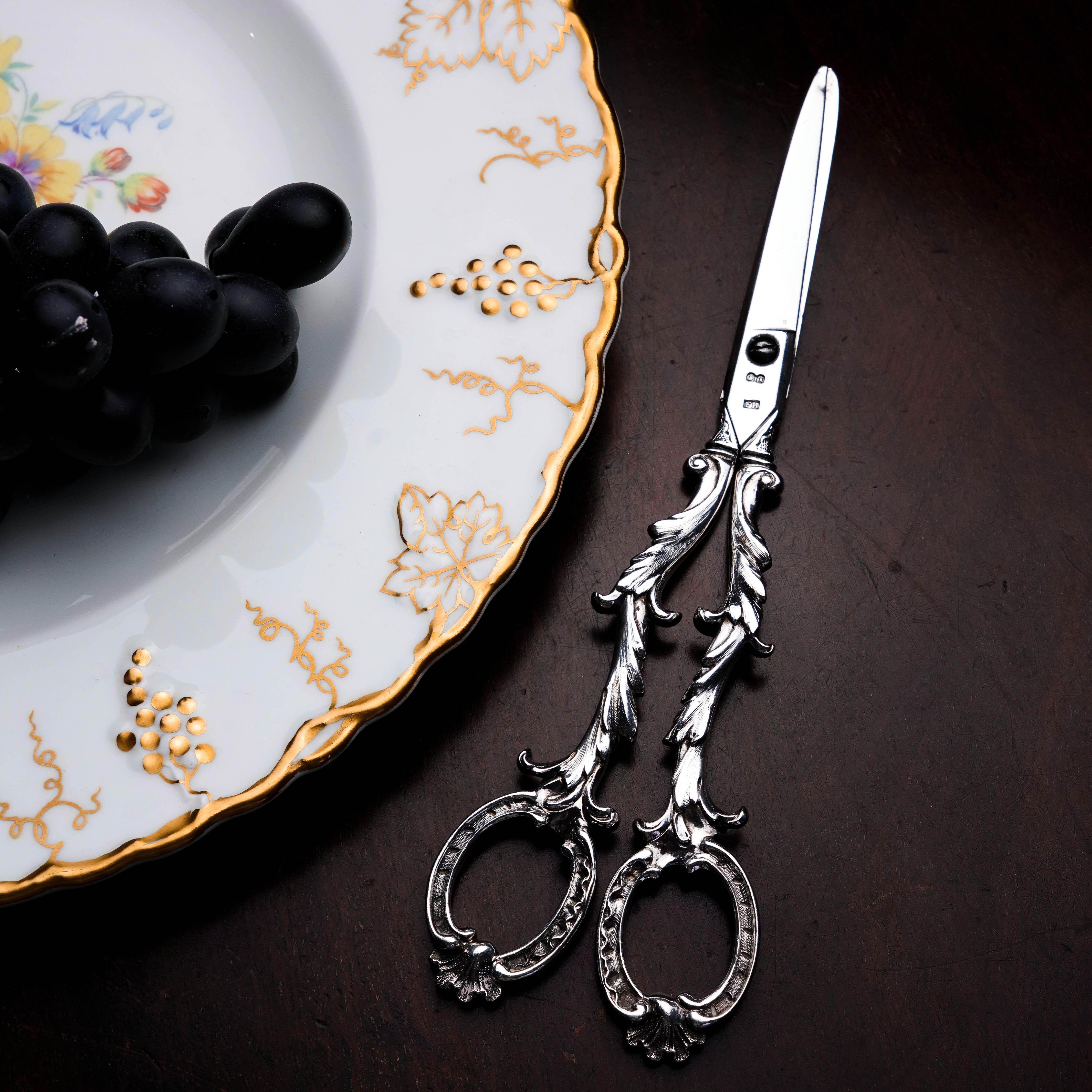 We are delighted to offer this fine quality, large & heavy Victorian solid silver grape scissors/shears made in London 1846 with the marks of Francis Higgins. 
 
Higgins' wares often feature an ornate, well thought out and intricate design that are