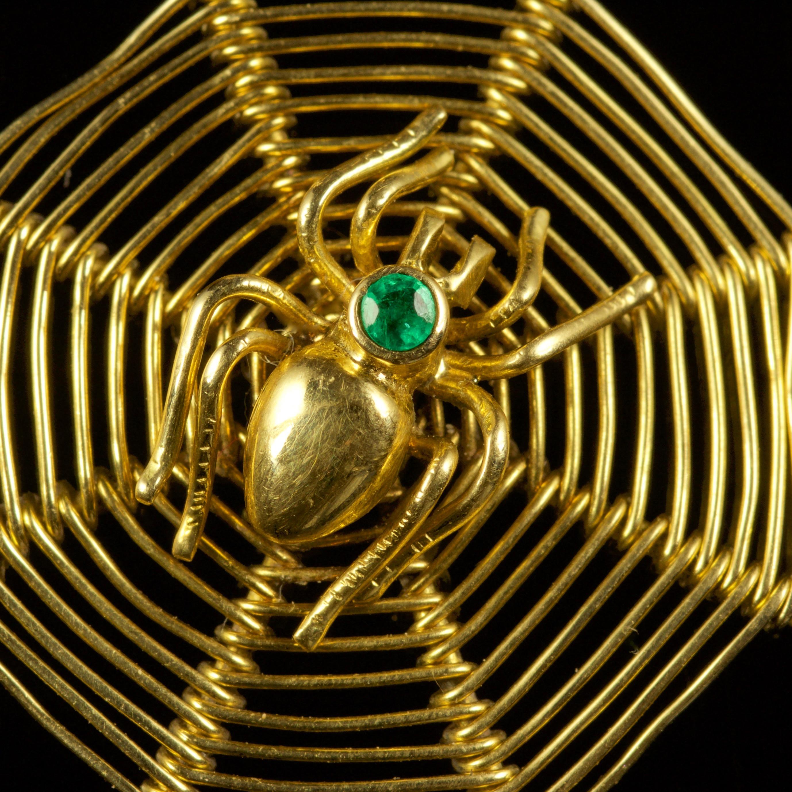 This marvellous Victorian Spider Web pendant is, Circa 1900.

The pendant is set in 18ct Yellow Gold, showing a Spiders Web with a Spider sat in the middle, finishing with an Emerald set into the Spiders head.

Insect or spider jewellery today is