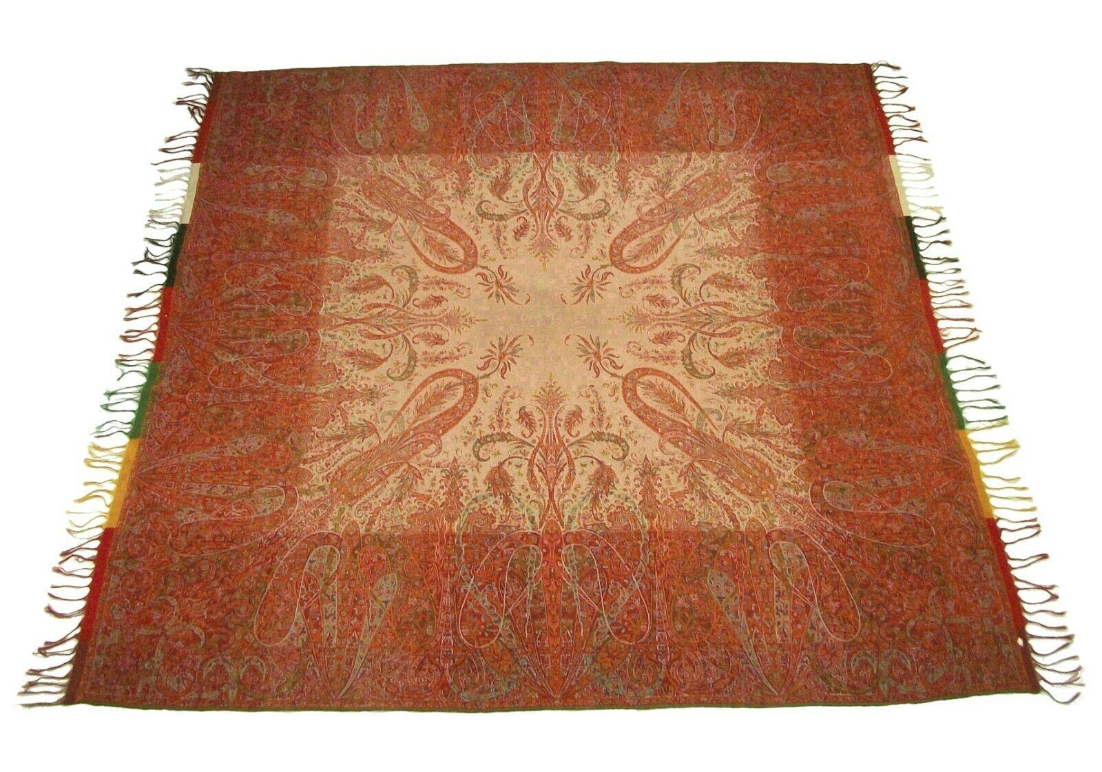 Antique Victorian paisley shawl - museum quality - fine jacquard weave pattern featuring 'boteh' and palms set against a beige center - color banded border with fringe - self woven edges on the other sides - 100% wool - unsigned - circa