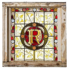 Antica vetrata vittoriana con monogramma