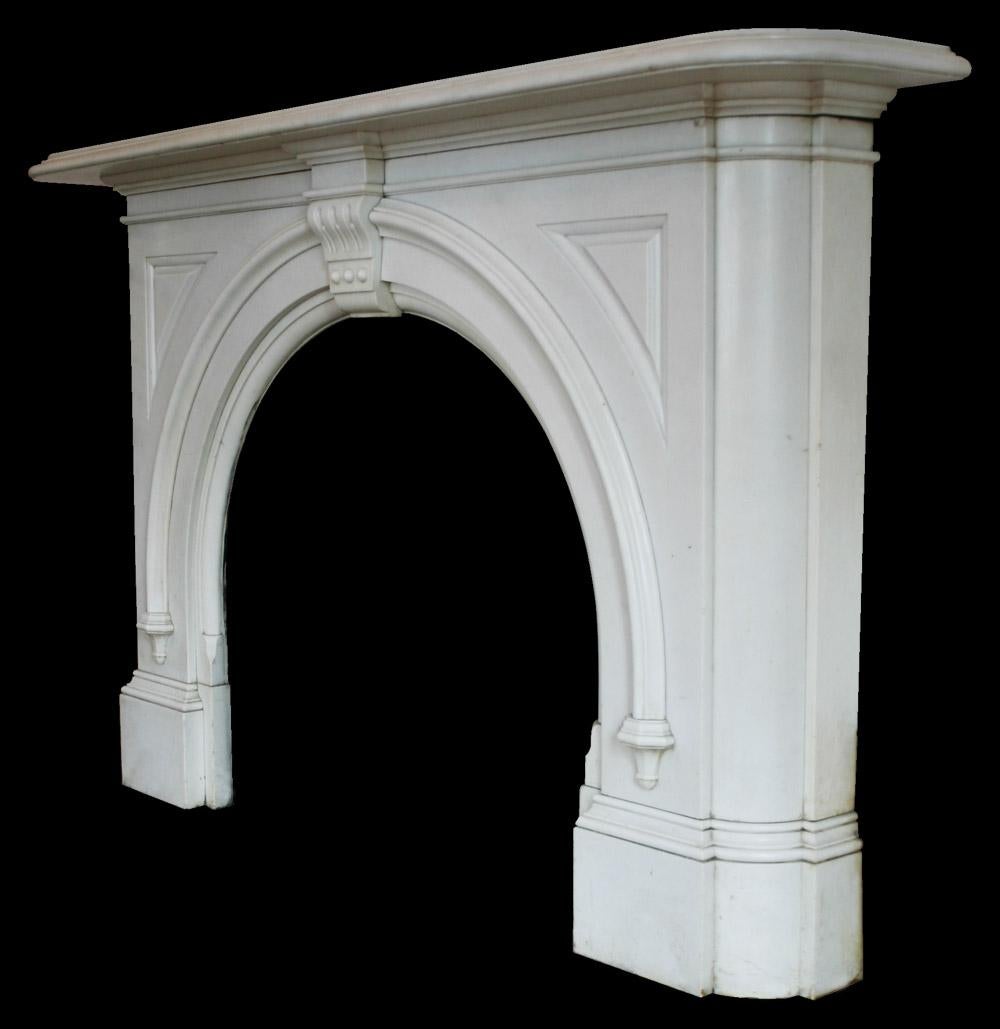 Large high quality antique late Victorian statuary white marble fire surround with arched aperture. 
Removed from a Victorian town house in Glasgow, Scotland, UK. 
For detailed sizes please see images.
Pictured with an original cast iron and tiled