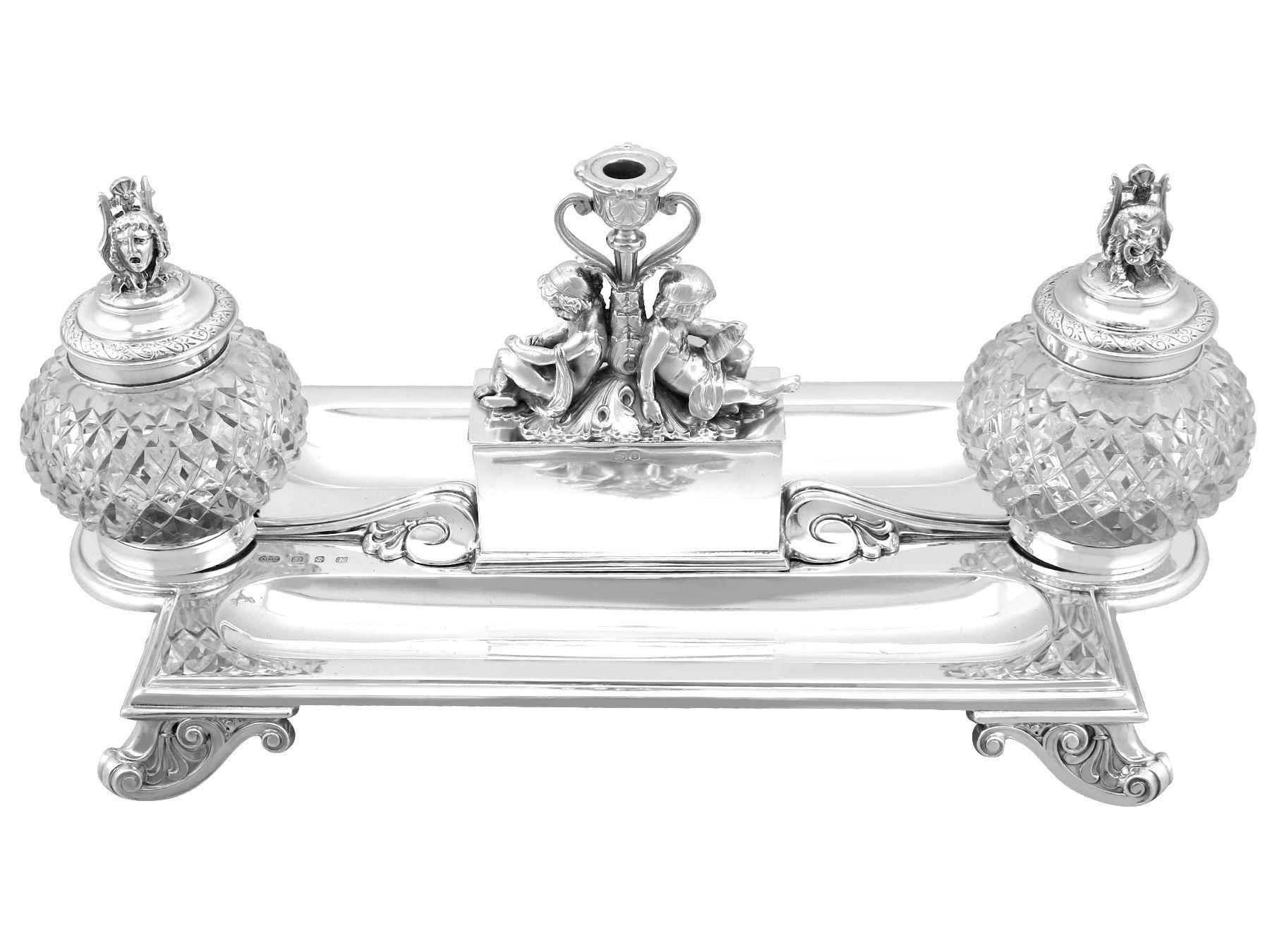 A magnificent, fine and impressive antique Victorian English sterling silver and glass inkstand / desk standish; an addition to our ornamental silverware collection.

This magnificent, fine and impressive antique Victorian silver inkstand / desk