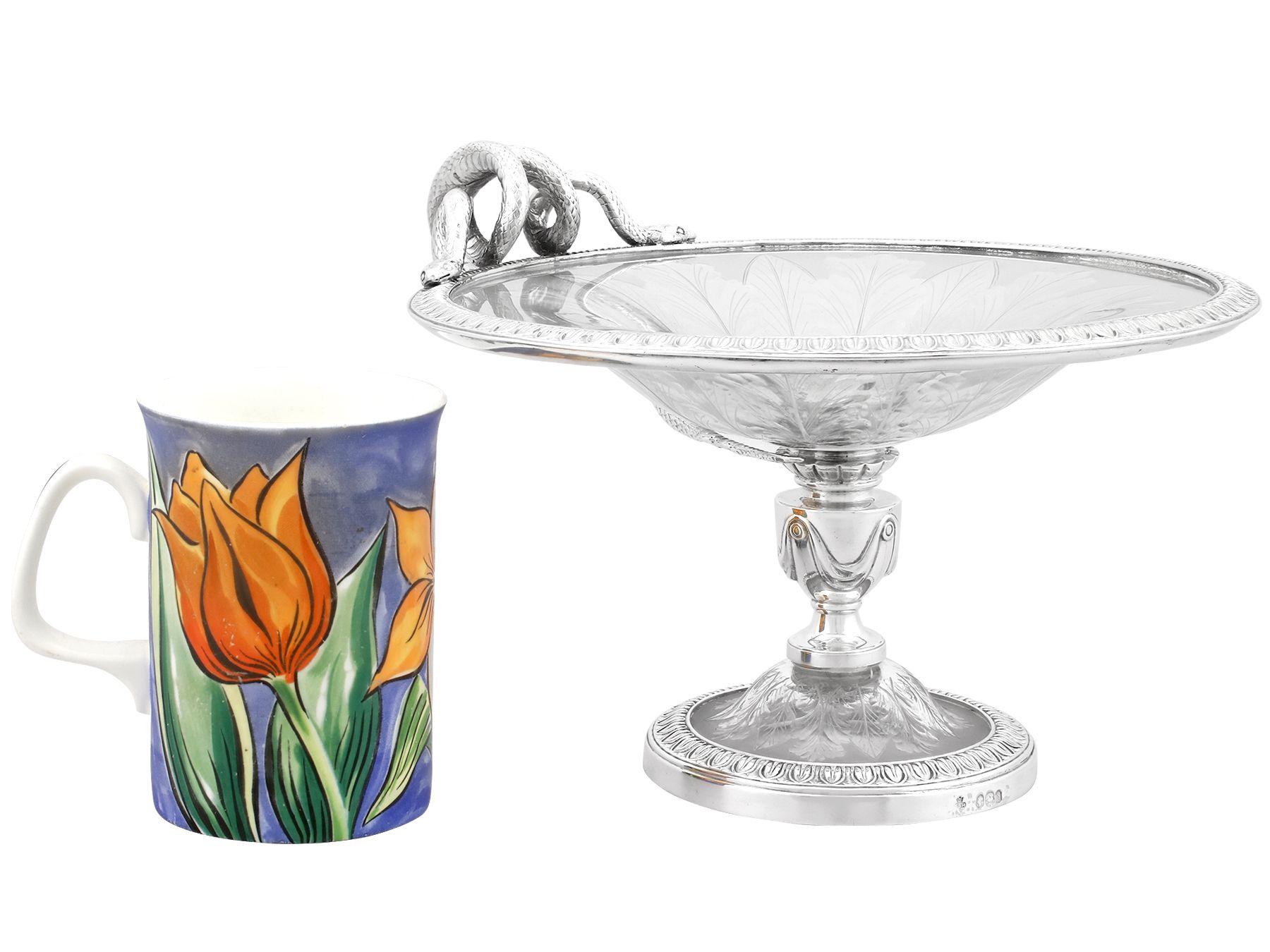 An exceptional, fine and impressive, pair of antique Victorian English sterling silver and glass tazzas/centrepieces; an addition to our antique Victorian silverware collection.

These exceptional antique Victorian glass tazzas / centrepieces,