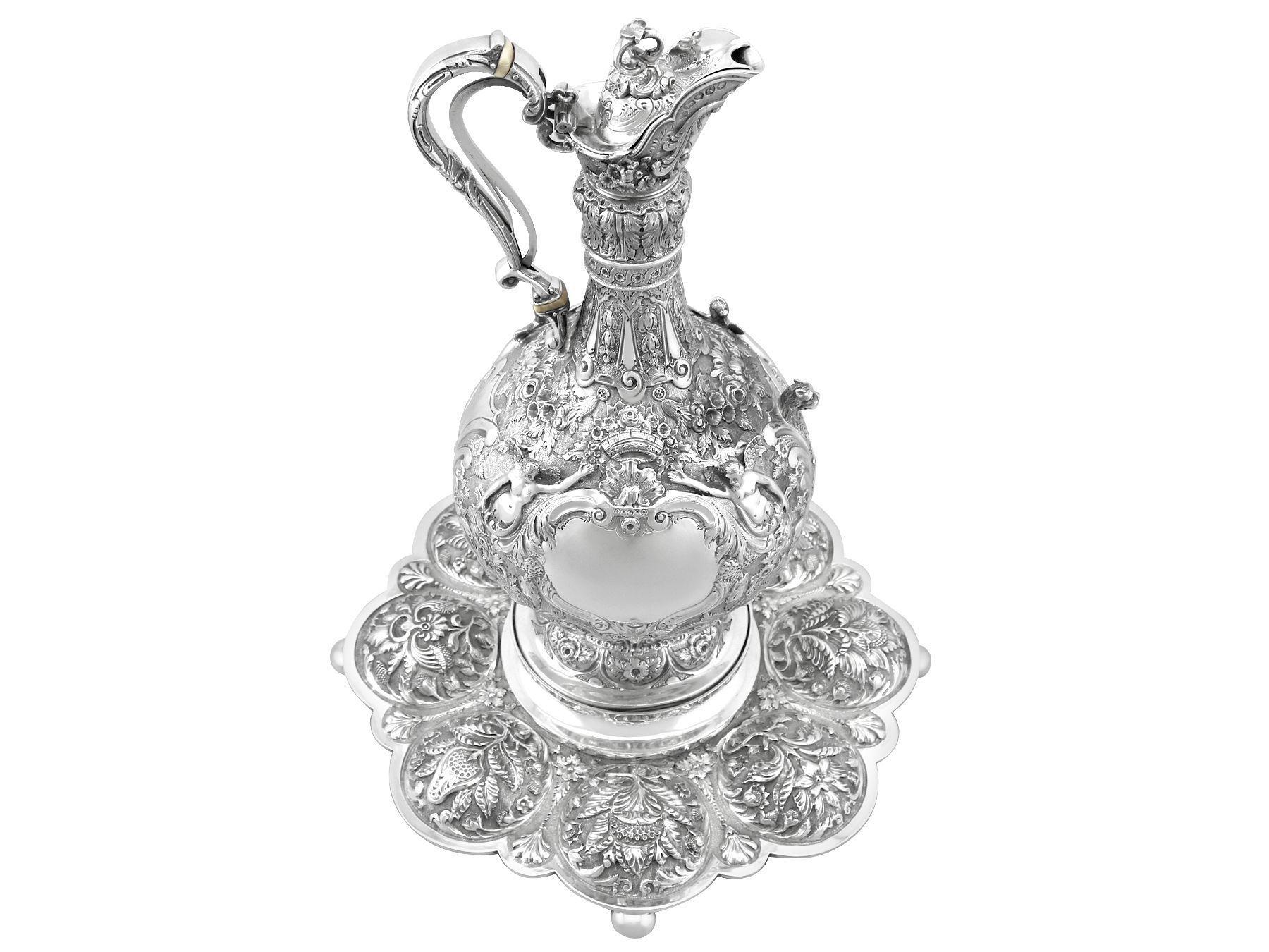 A magnificent, fine and impressive antique Victorian English sterling silver Armada jug and stand; part of our wine and drinks related silverware collection

This magnificent antique Victorian English sterling silver Armada jug has an elongated