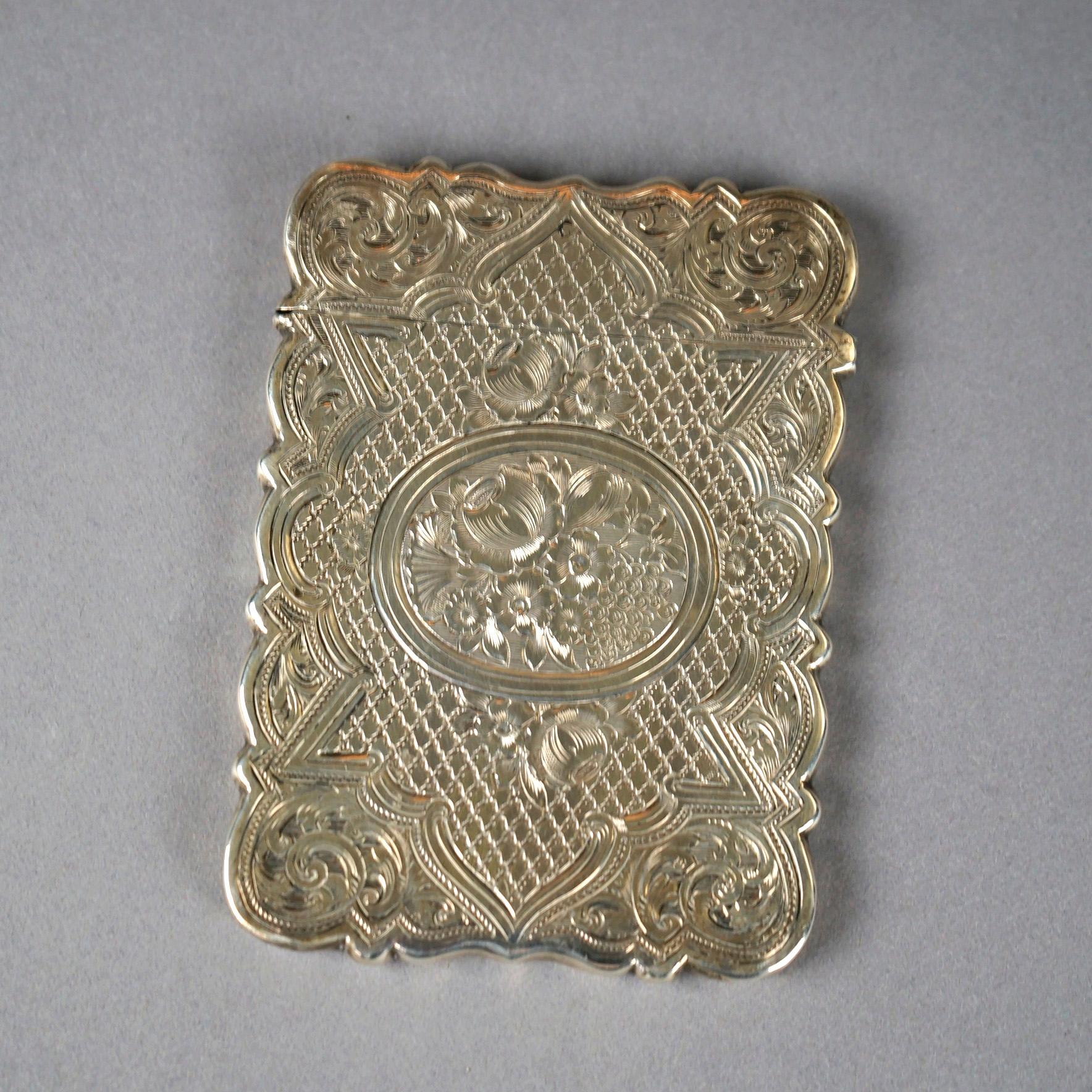 An antique Victorian calling card case offers sterling silver construction with foliate and scroll elements, c1890, 1,85 toz

Measures- 3.75''H x .25''W x 2.75''D.