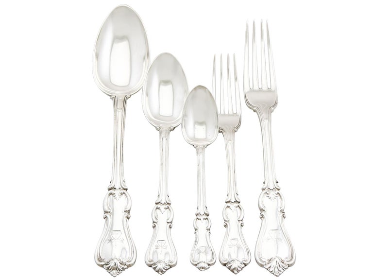 A magnificent, fine and impressive antique Victorian English sterling silver straight Albert pattern flatware service for twelve persons made by William Eaton; an addition to our canteen of cutlery collection.

The pieces of this exceptional,