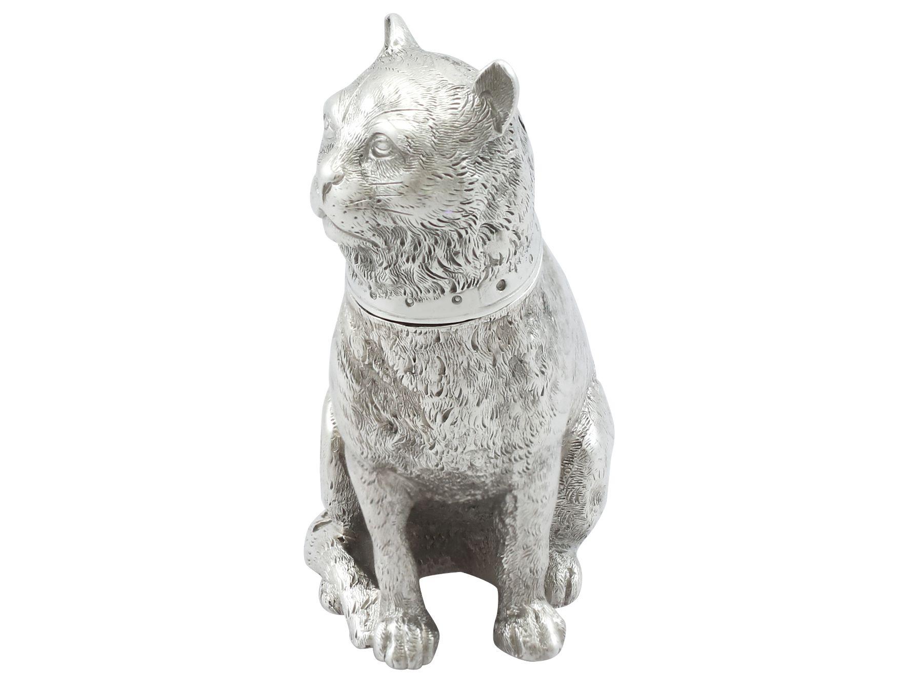 An exceptional, fine and impressive antique Victorian English sterling silver pepper shaker modelled in the form of a cat; an addition to our animal related silverware collection.

This exceptional, fine and impressive antique Victorian cast