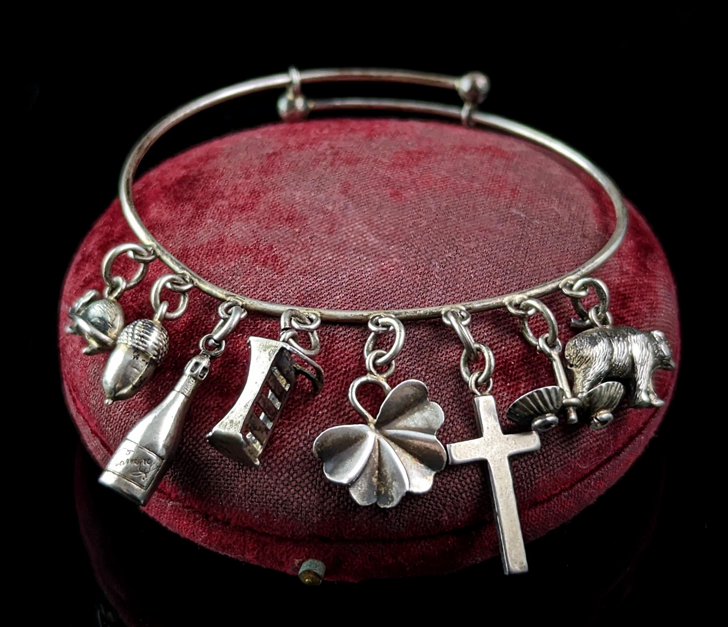 Antique Victorian sterling silver charm bracelet, bangle, Charms  In Fair Condition In NEWARK, GB