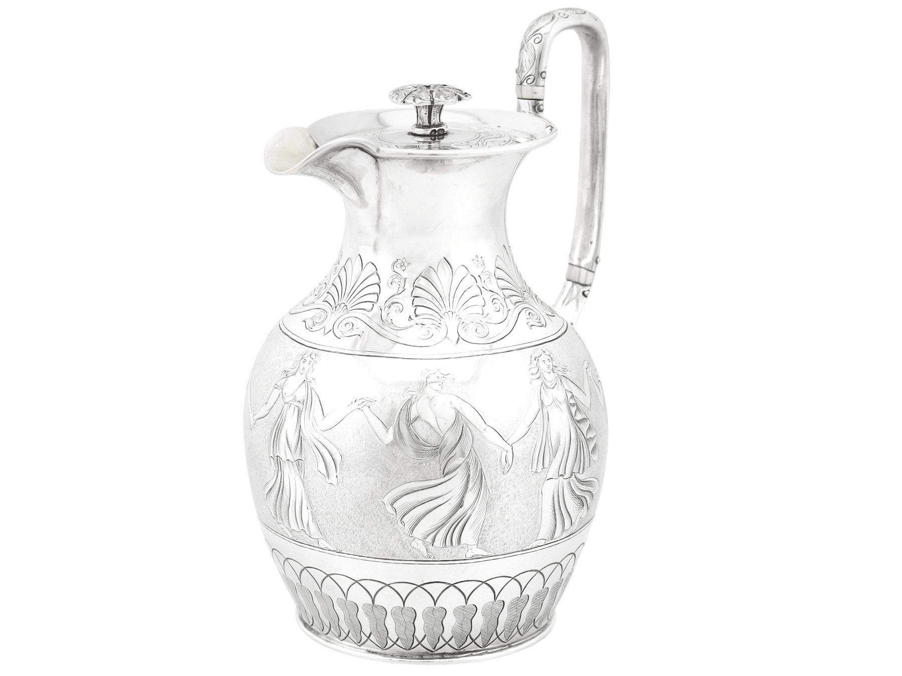 An exceptional, fine and impressive antique Victorian English sterling silver coffee jug made by Joseph Angell I & Joseph Angell II; an addition to our antique silverware collection.

This exceptional antique sterling silver coffee jug, in