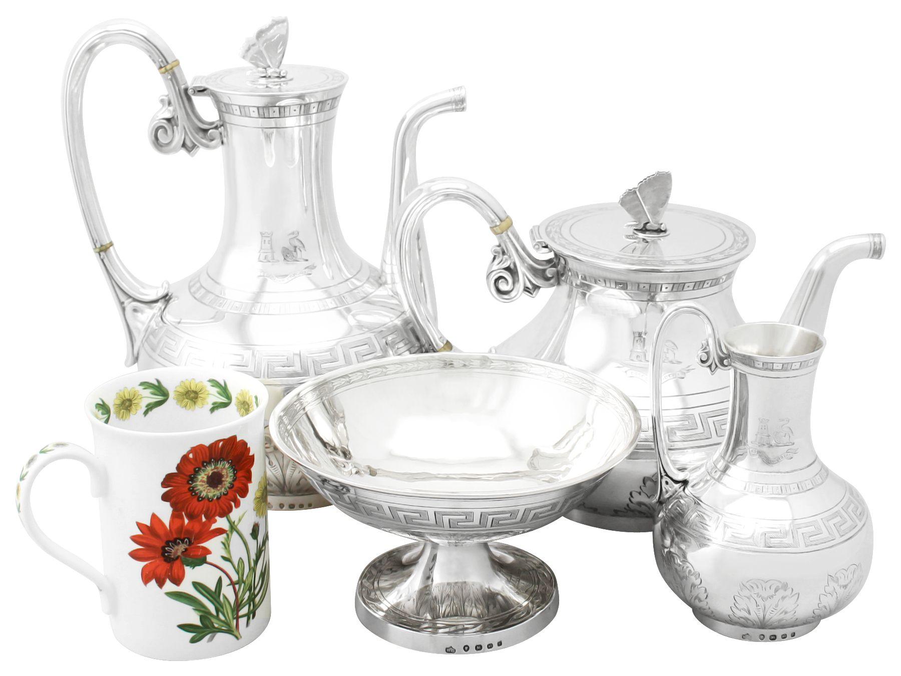 A fine, impressive and unusual antique Victorian English sterling silver composite four piece tea and coffee service / set in the Aesthetic style; part of our silver teaware collection.

This exceptional and unusual Victorian sterling silver tea
