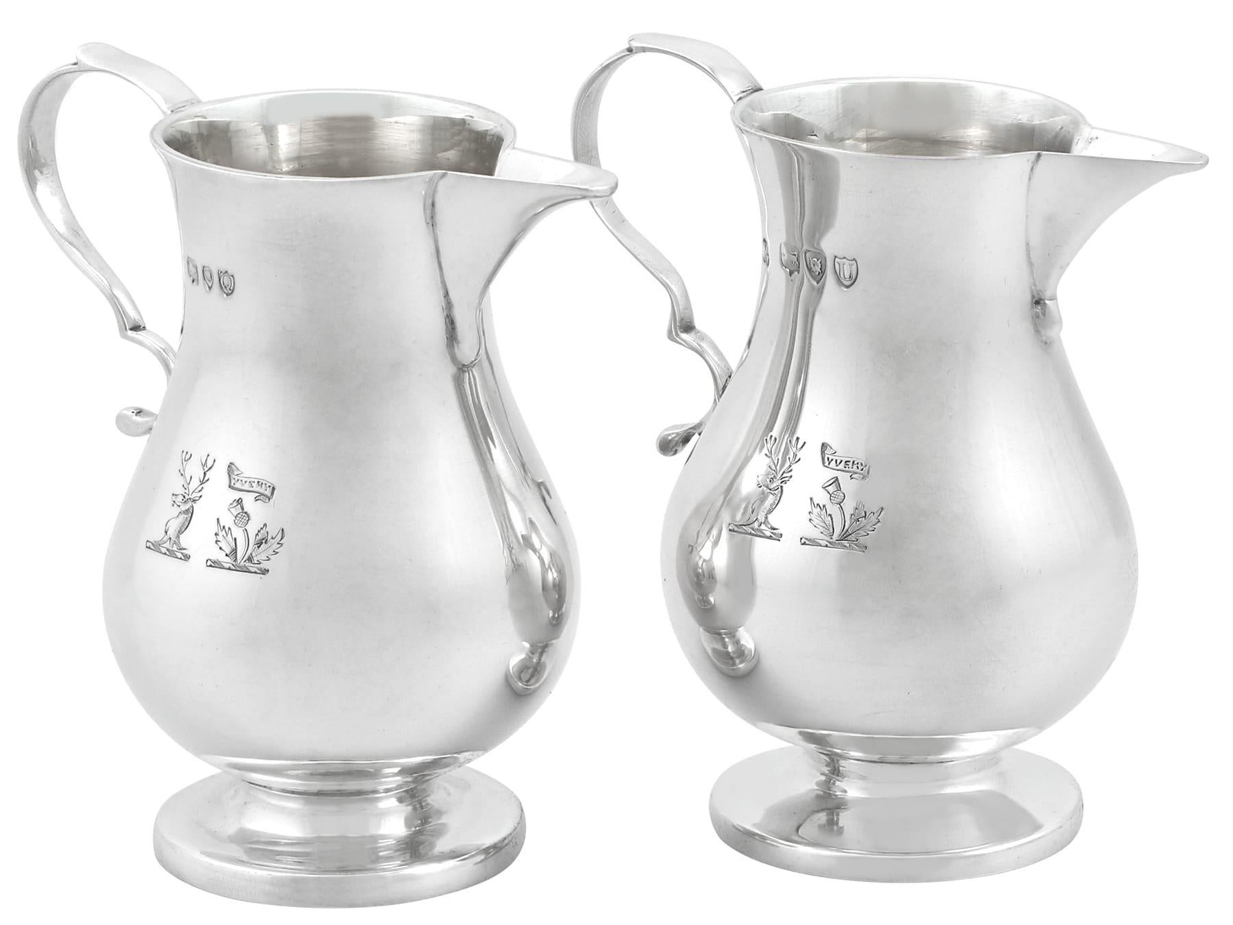 A fine and impressive pair of antique Victorian English sterling silver sparrow beak style creamers, boxed; an addition to our silver teaware collection.

These impressive antique Victorian sterling silver cream jugs have a plain baluster sparrow