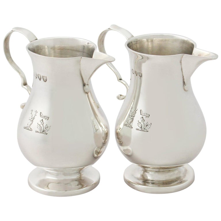 A fine and impressive pair of antique Victorian English sterling silver sparrow beak style creamers, boxed; an addition to our silver teaware collection.

These impressive antique Victorian sterling silver cream jugs have a plain baluster sparrow