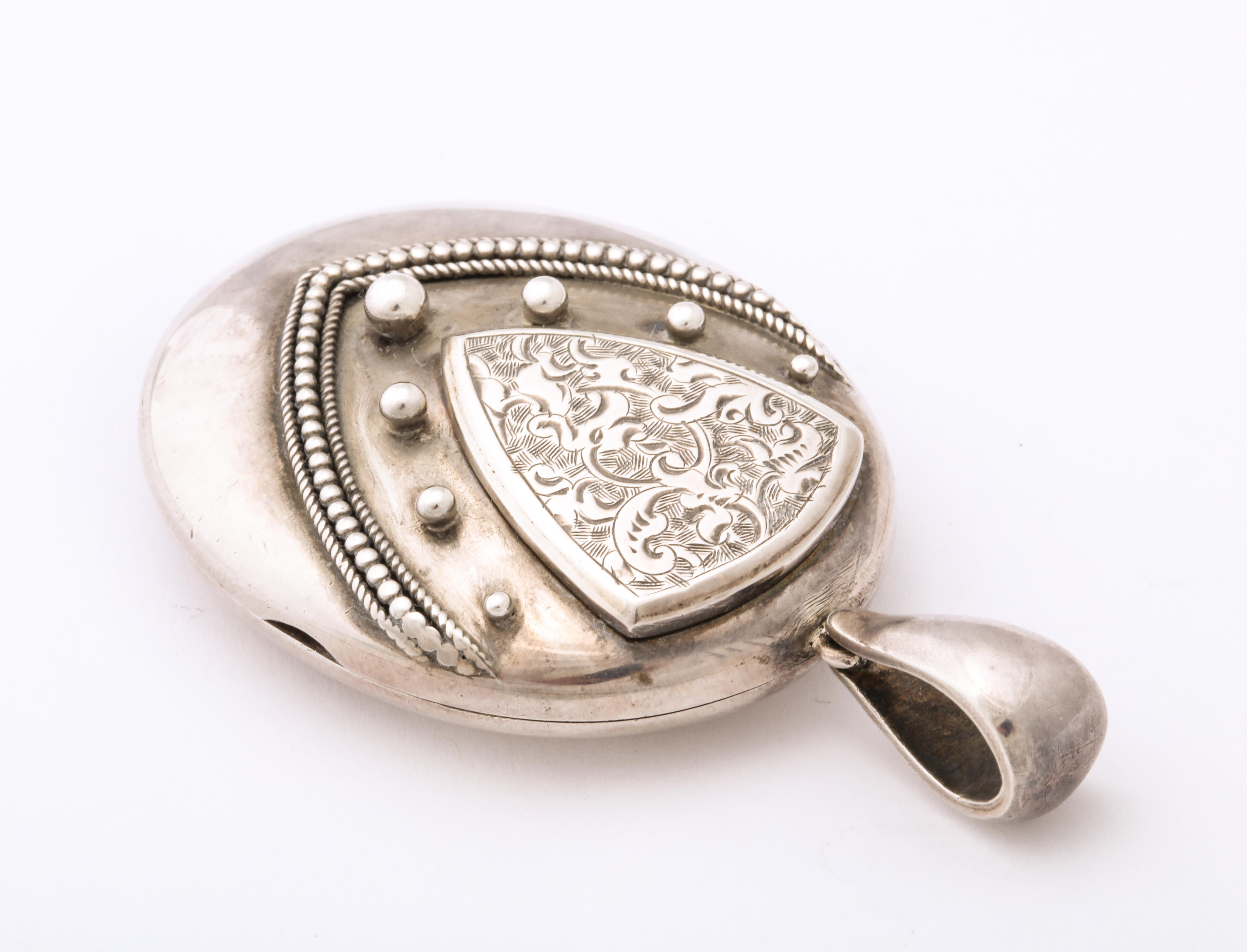 silver locket engraved