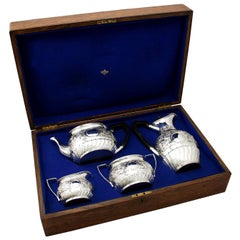 Service à thé et café quatre pièces en argent sterling de style victorien antique