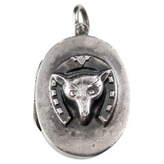 Antique Victorian sterling silver fox and horseshoe locket 