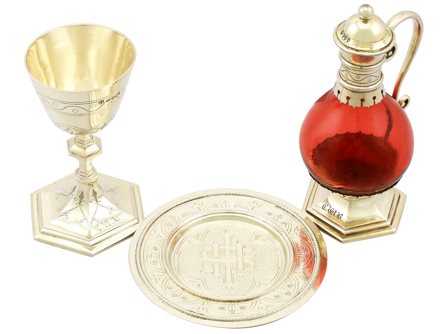 An exceptional, fine and impressive antique Victorian English sterling silver gilt and cranberry coloured glass communion set; an addition to our diverse religious silverware collection.

This exceptional antique Victorian cast sterling silver