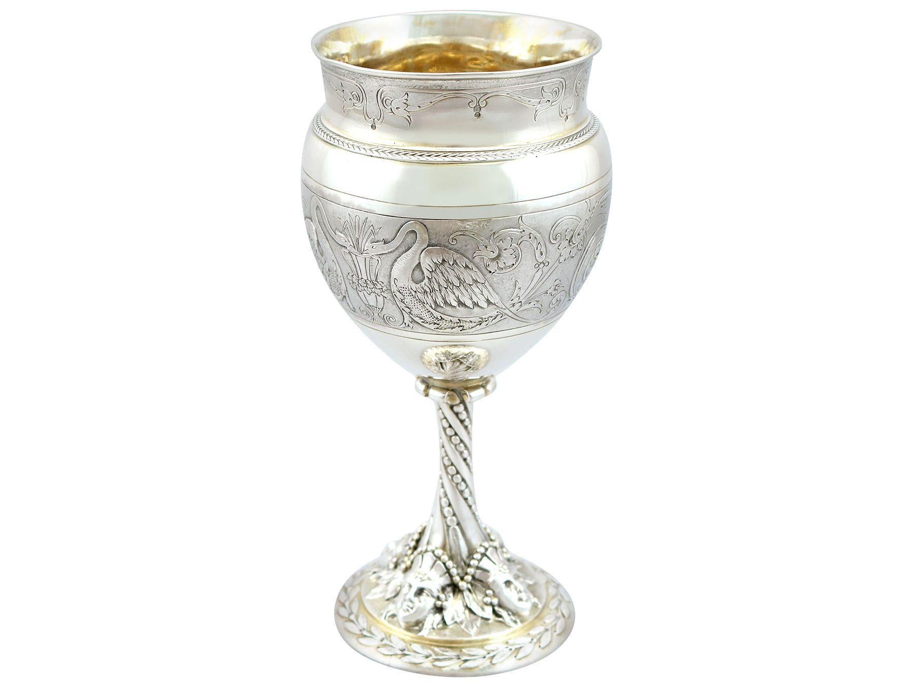 An exceptional, fine and impressive antique Victorian sterling silver gilt goblet; an addition to our wine and drinks related silverware collection.

This exceptional antique Victorian sterling silver gilt goblet has a circular bulbous-shaped form