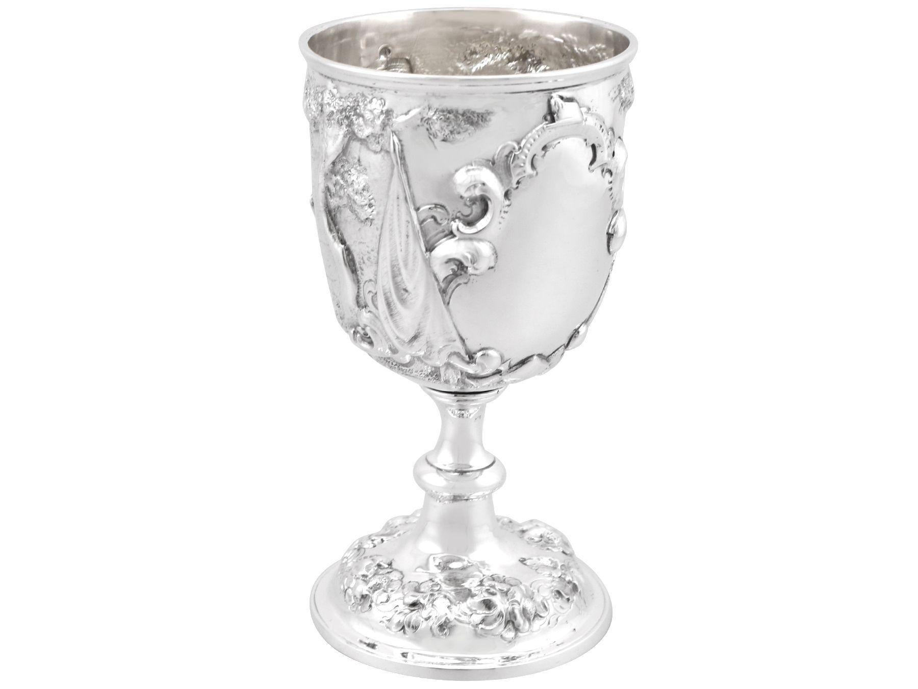 An exceptional, fine and impressive antique Victorian English sterling silver goblet; an addition to our collection of wine and drinks related silverware.

This exceptional antique Victorian sterling silver goblet has a circular bell-shaped form