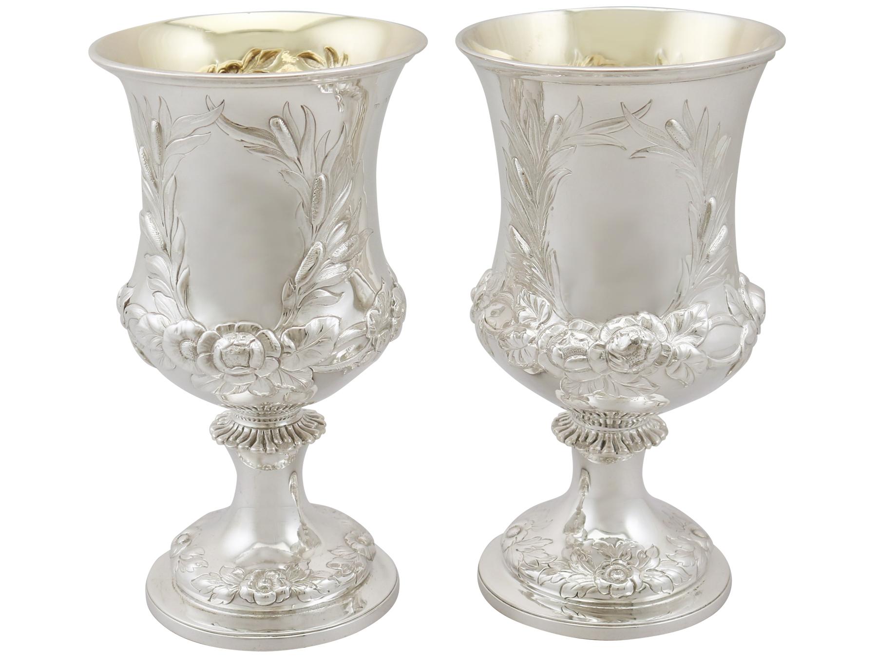 An exceptional, fine and impressive composite pair of antique Victorian English sterling silver goblets; an addition to our range of wine and drink related silverware.

These exceptional antique Victorian composite English sterling silver goblets