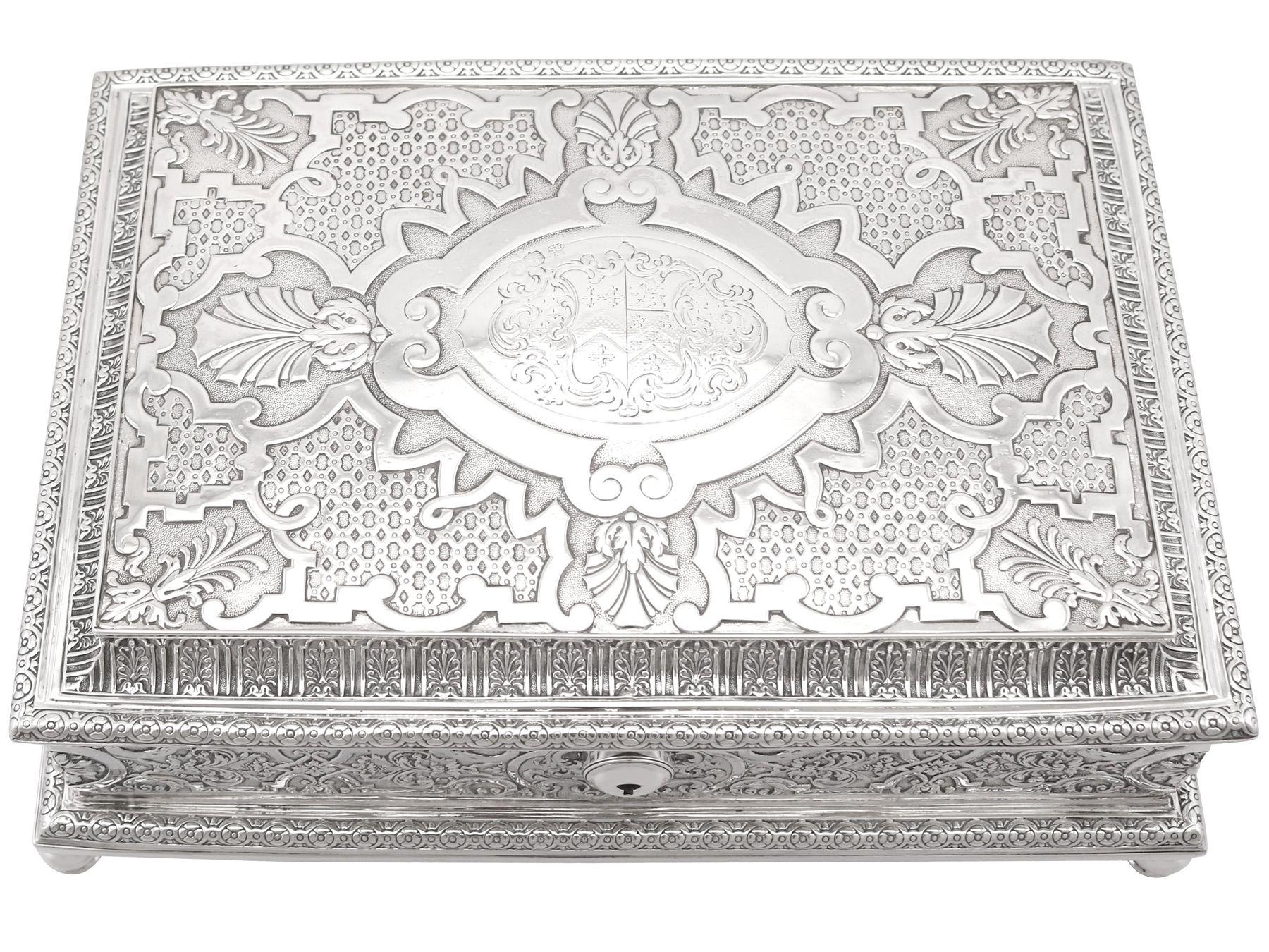 A magnificent, fine and impressive, large antique Victorian English sterling silver locking jewellery casket; an addition to the ornamental silverware collection.

This magnificent and large antique sterling silver jewellery box/casket has a
