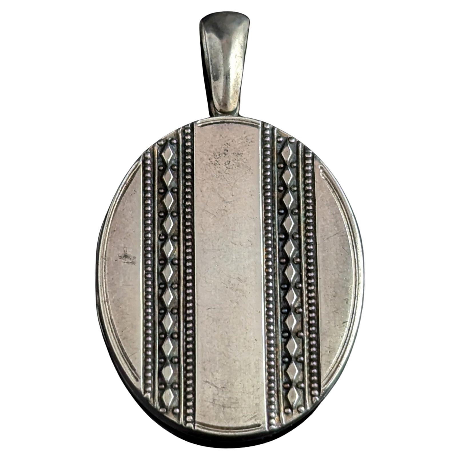 Antique Victorian sterling silver locket pendant