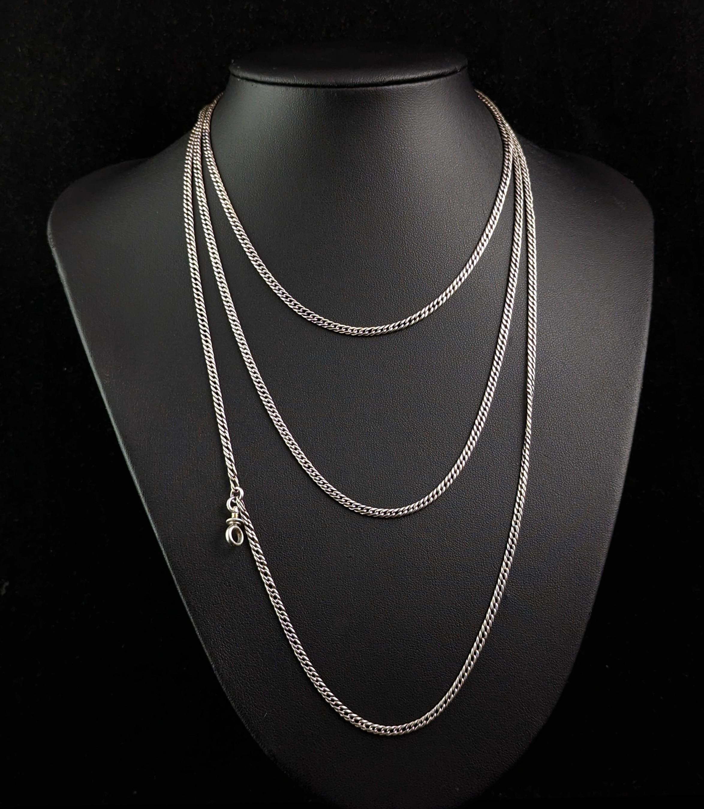 This gorgeous antique silver long chain or longuard chain necklace is everything you could hope for in a long chain.

It is a lovely long length chain at 58