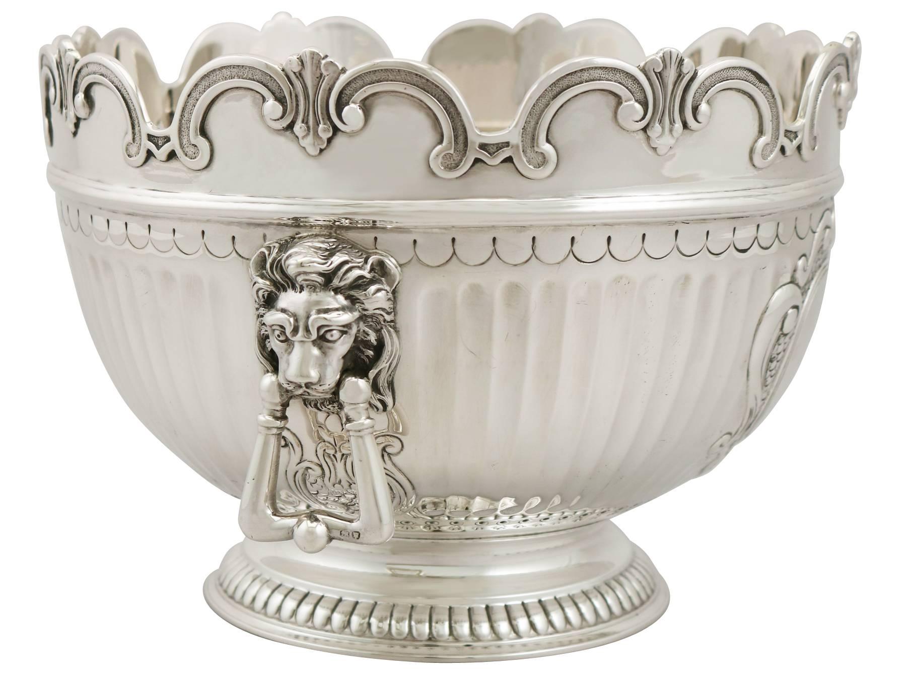 An exceptional, fine and impressive antique Victorian English sterling silver Monteith style bowl; an addition to our range of collectable silverware.


This exceptional antique Victorian sterling silver bowl has a Monteith form onto a domed
