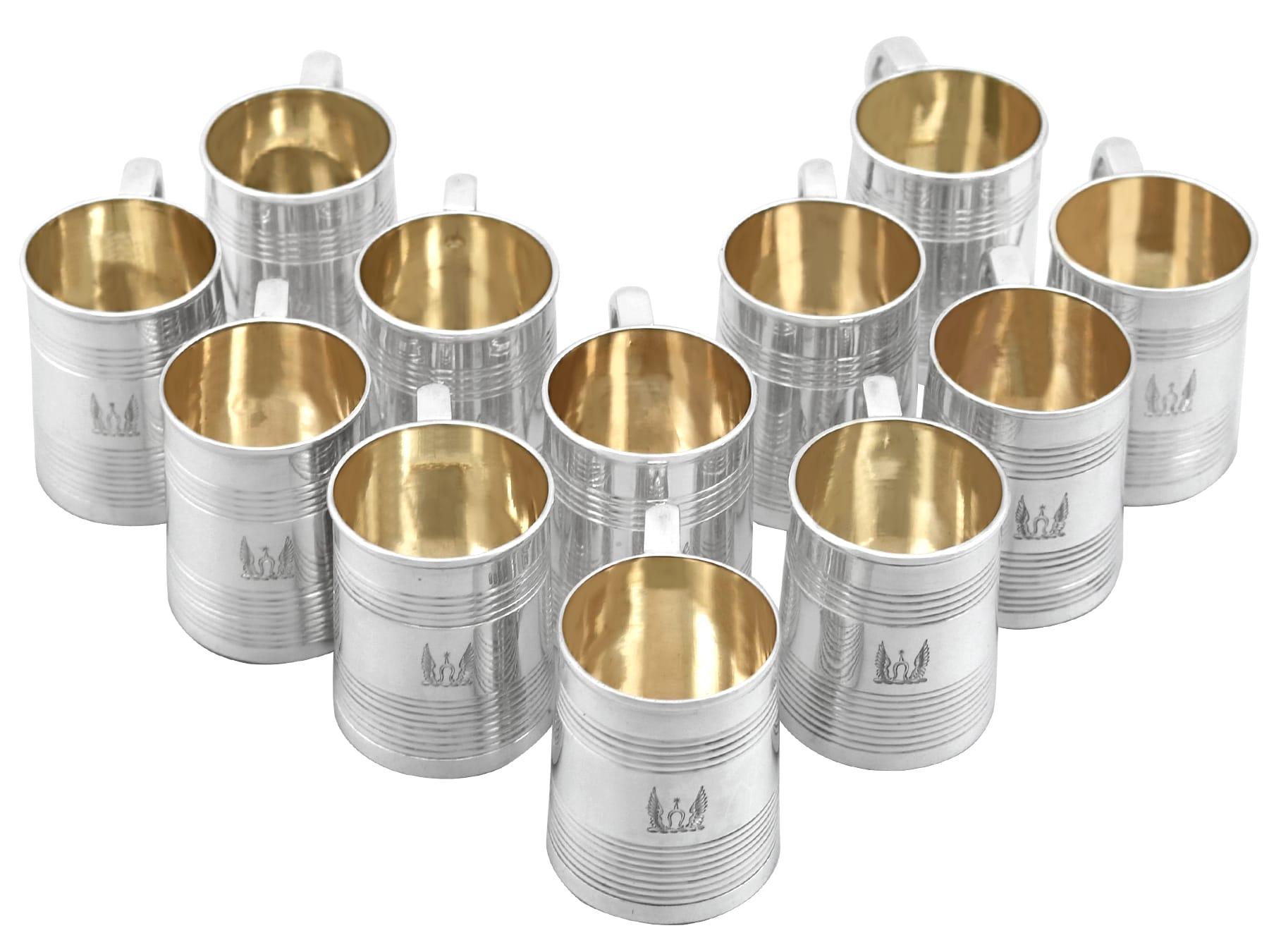 An exceptional, fine and impressive, rare set of twelve antique Victorian English sterling silver tot mugs - boxed; an addition to our range of wine and drink related silverware

These exceptional antique Victorian sterling silver mugs/tot cups have