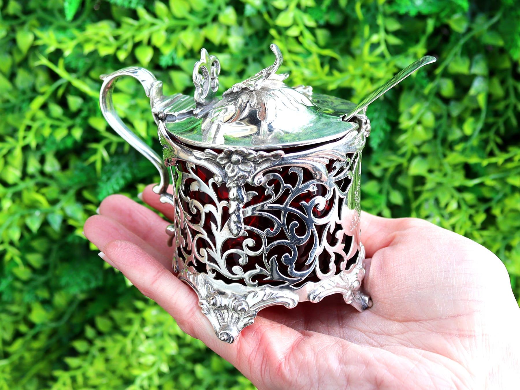 An exceptional, fine and impressive, large antique Victorian sterling silver and cranberry coloured glass mustard pot; an addition to our Victorian silver cruets/condiments collection.

This exceptional antique Victorian sterling silver mustard pot