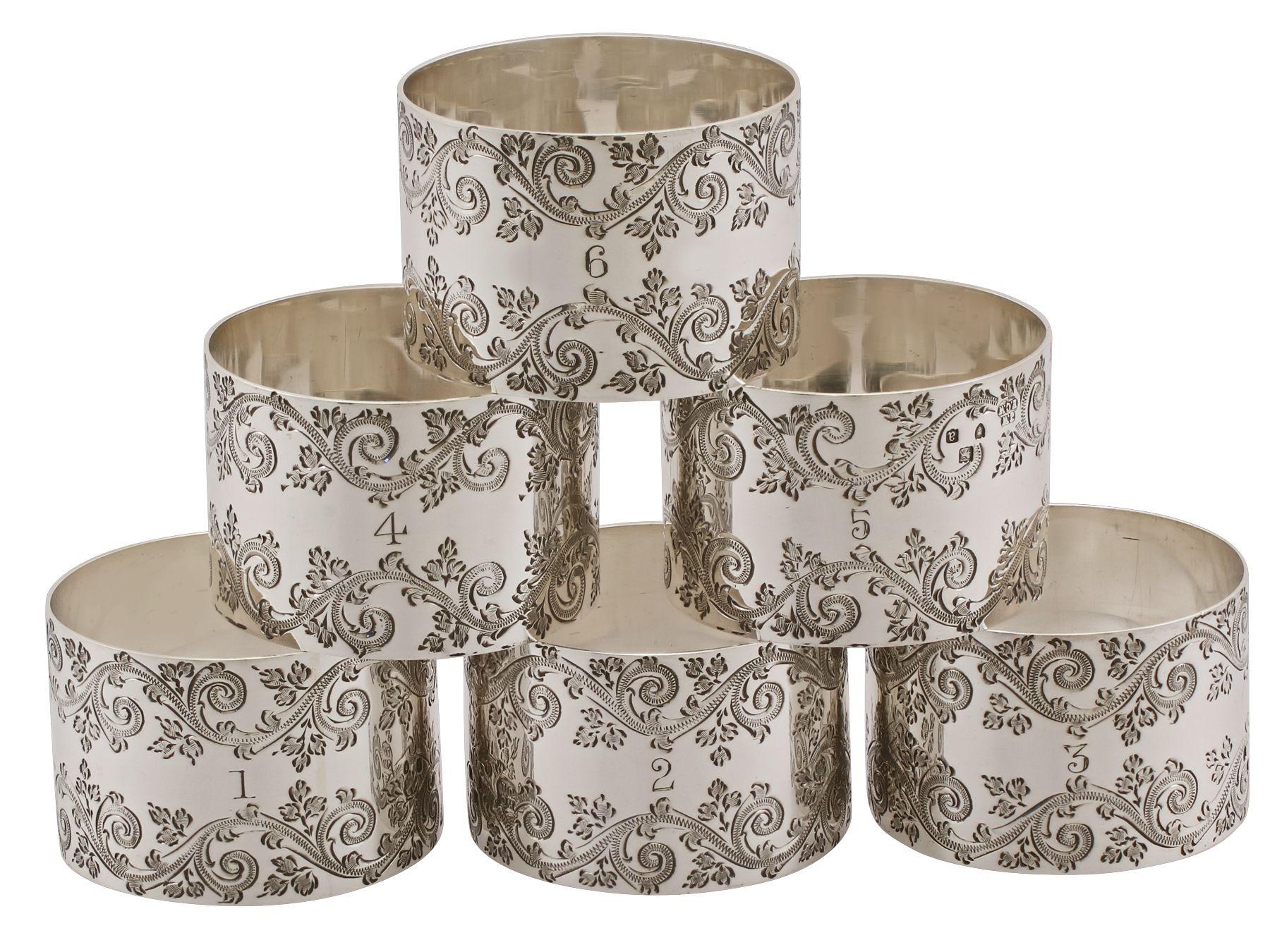 An exceptional, fine and impressive set of six individually numbered antique Victorian English sterling silver napkin rings - boxed; part of our silver dining collection.

This exceptional, fine and impressive set of antique Victorian numbered