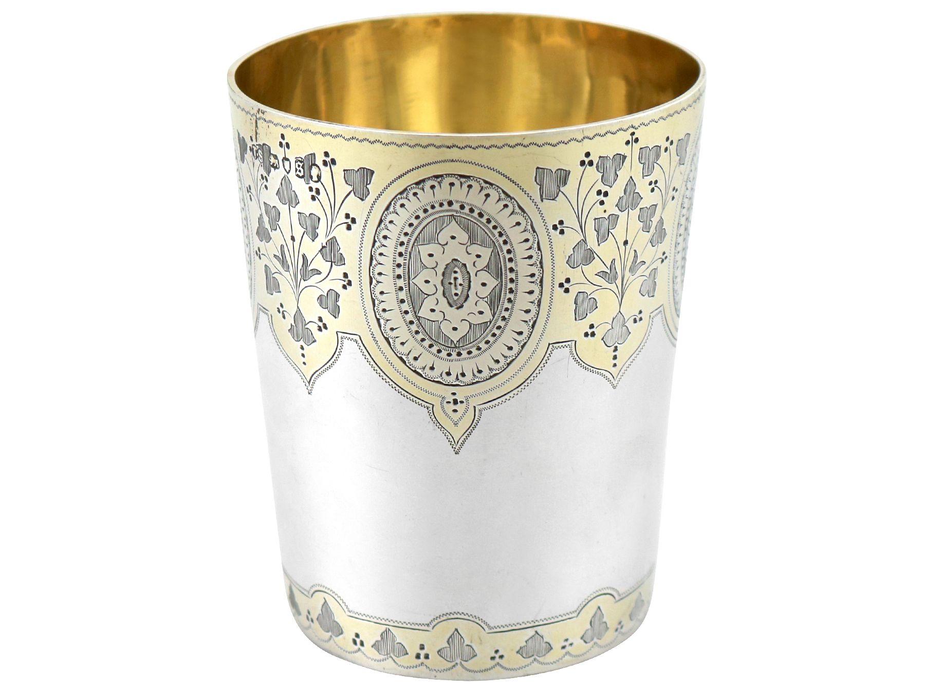 An exceptional, fine and impressive antique Victorian English sterling silver parcel gilt beaker; an addition to our ornamental silverware collection

This exceptional antique Victorian sterling silver beaker has a cylindrical, tapering