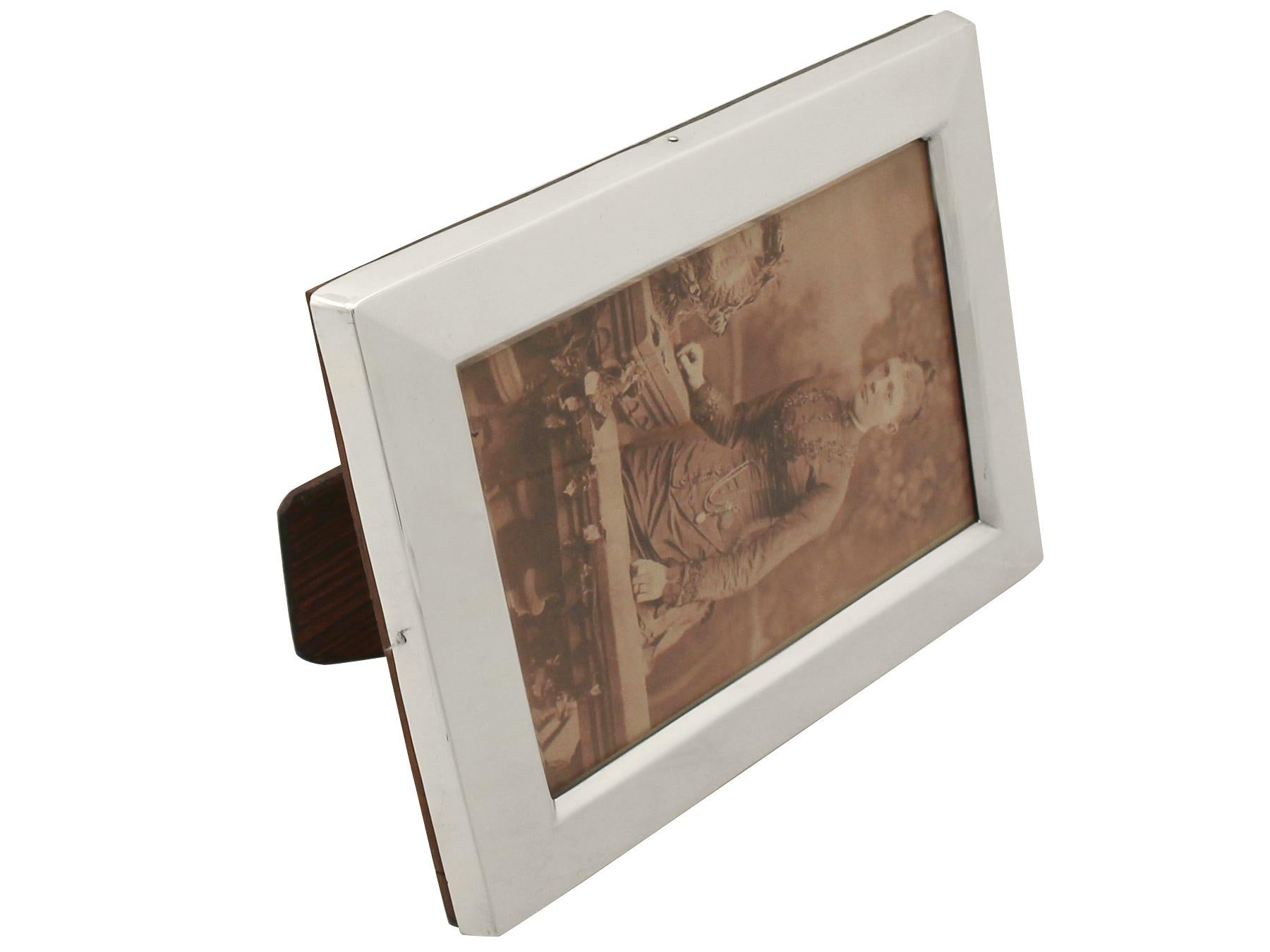 A fine and impressive antique Victorian English sterling silver photograph frame, an addition to our ornamental silverware collection

This exceptional antique Victorian sterling silver photograph frame has a plain rectangular form.

The