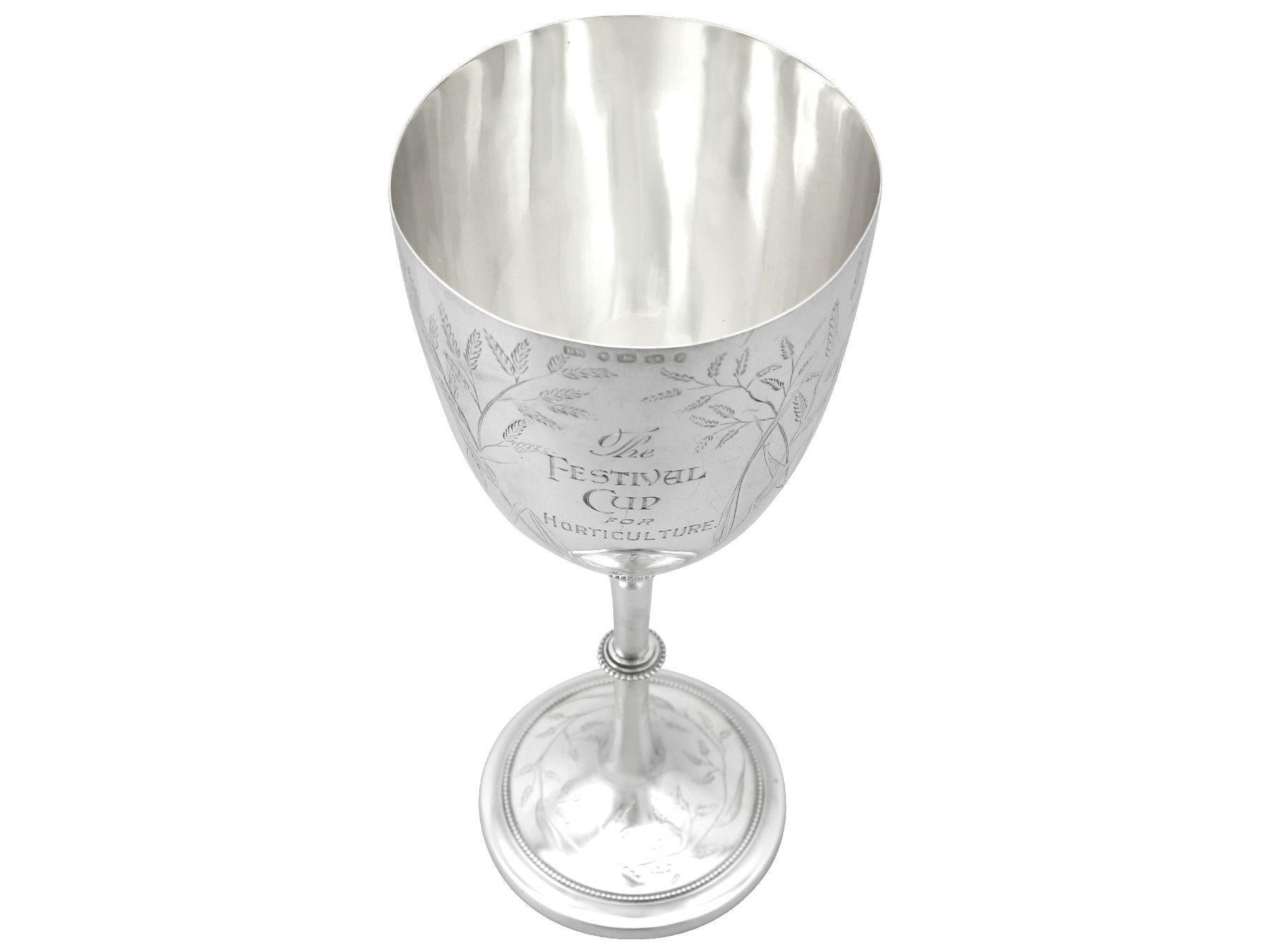 An exceptional, fine and impressive, rare antique Victorian English sterling silver presentation goblet/cup; an addition to our collection of presentation related silverware.

This exceptional antique sterling silver presentation goblet / cup has