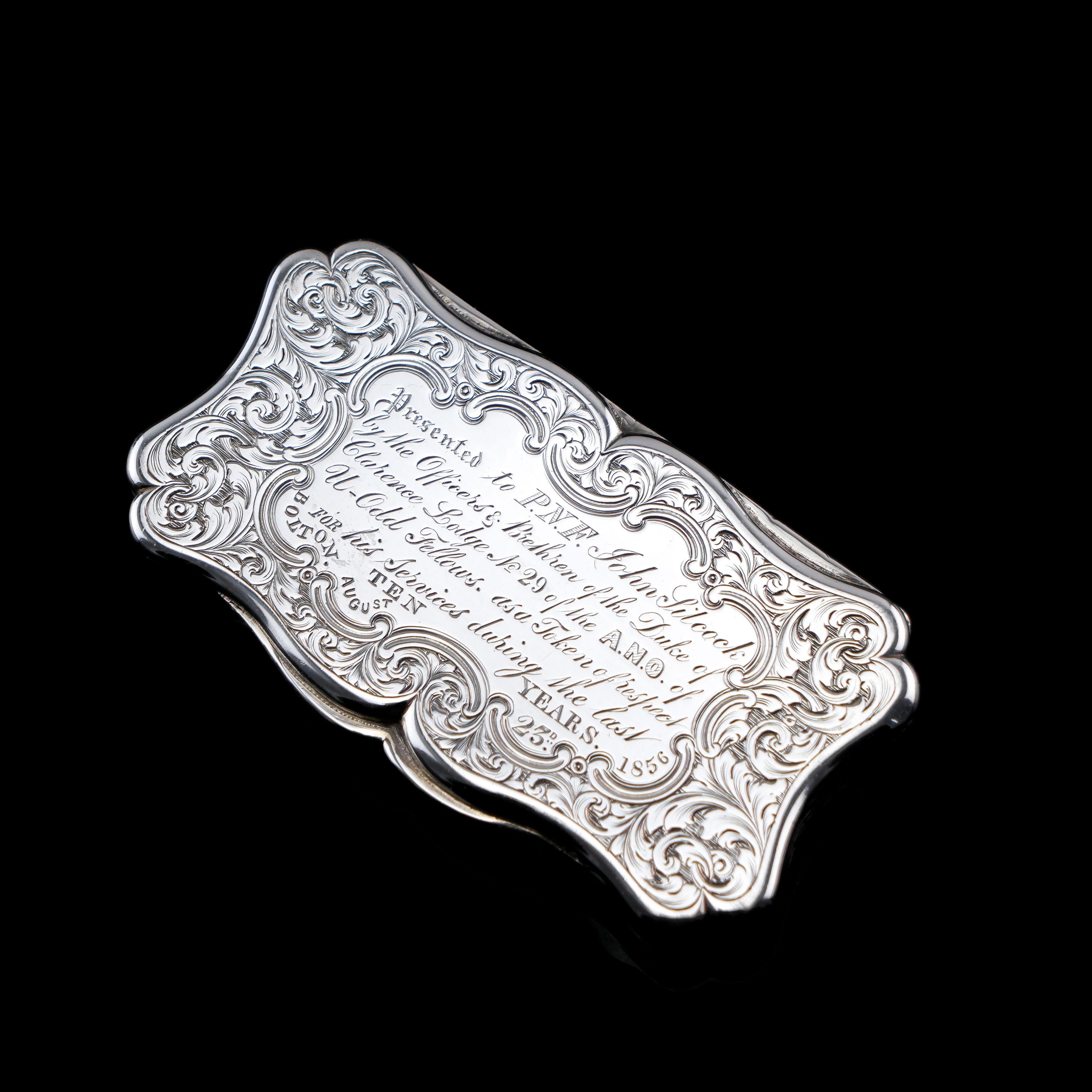 We are delighted to offer this beautiful hand-engraved solid silver snuff box made in Birmingham in 1850 with the maker's mark of Edward Smith.
  
This snuff box is an exemplary piece of intricate Victorian silverware displaying the most desirable