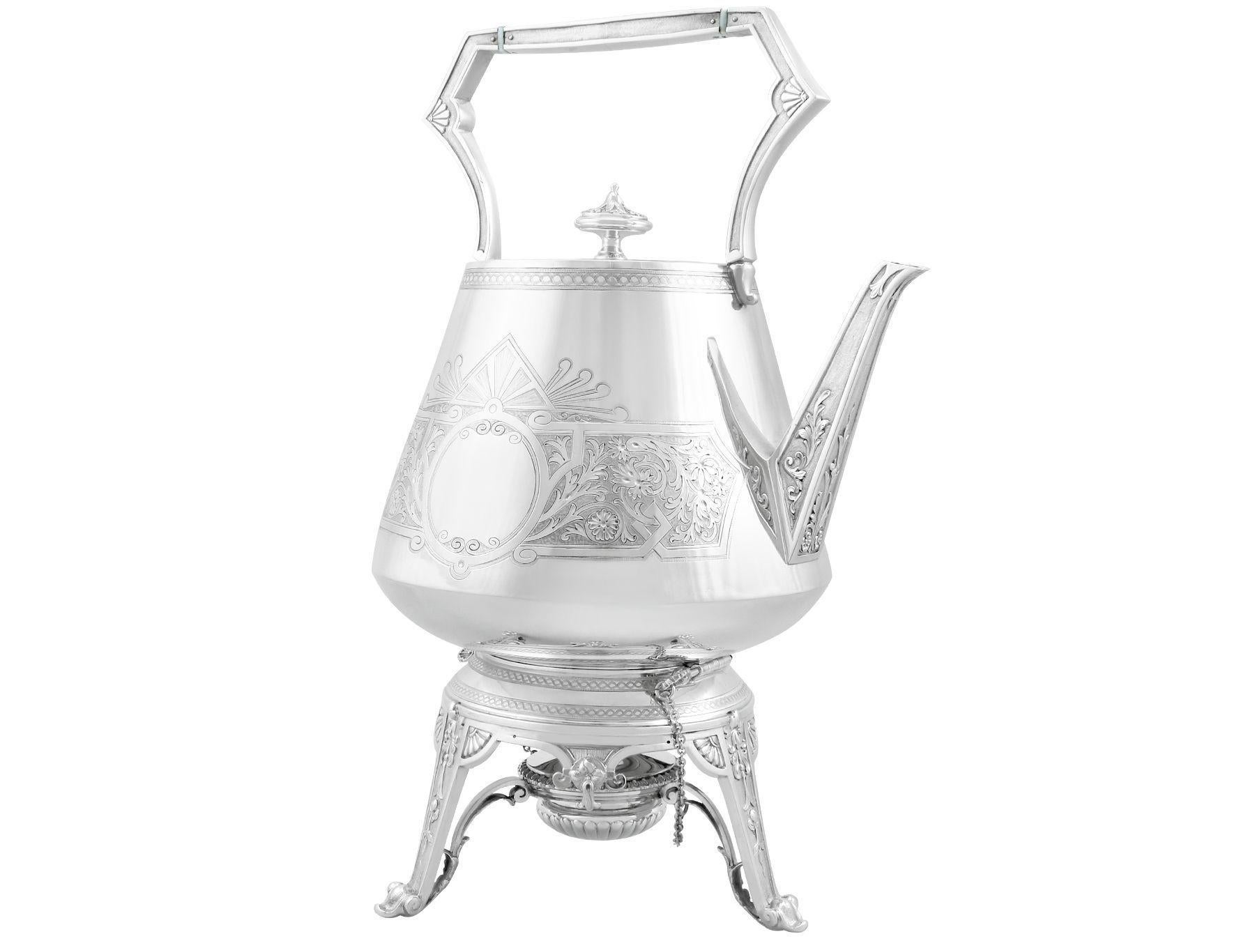 An exceptional, fine and impressive antique Victorian English sterling silver spirit kettle; an addition to our antique silver teaware collection

This antique Victorian sterling silver kettle has a tapering, circular rounded form.

The surface